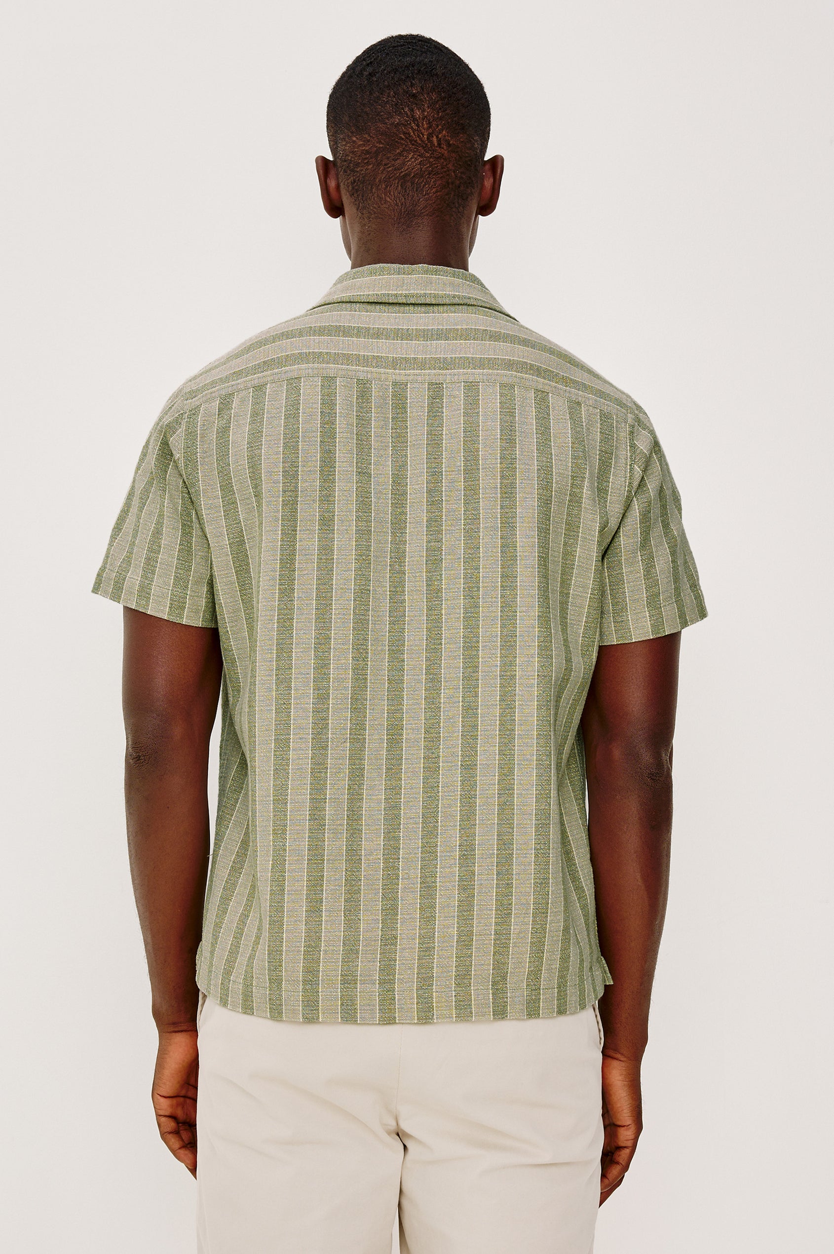 Fielder Button Front Shirt With Short Sleeves and Relaxed Boxy Fit in Sage Brush Stripe Colorway - Upper Body Back View Featured on Model