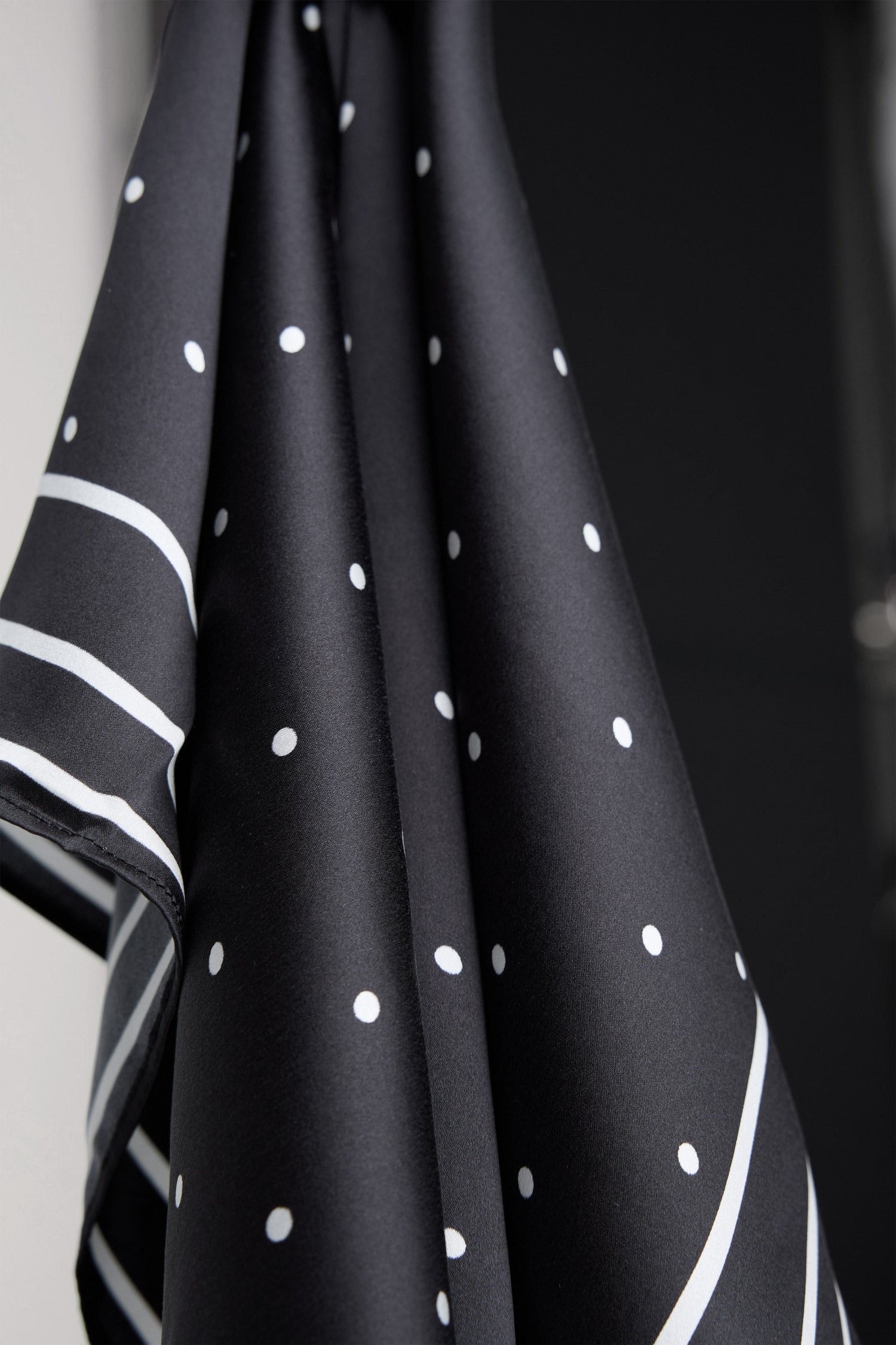 Finna Square Scarf in 100% Silk With Contrast Polka Dots and Striped Outline in Black Colorway - Close Up View Featured