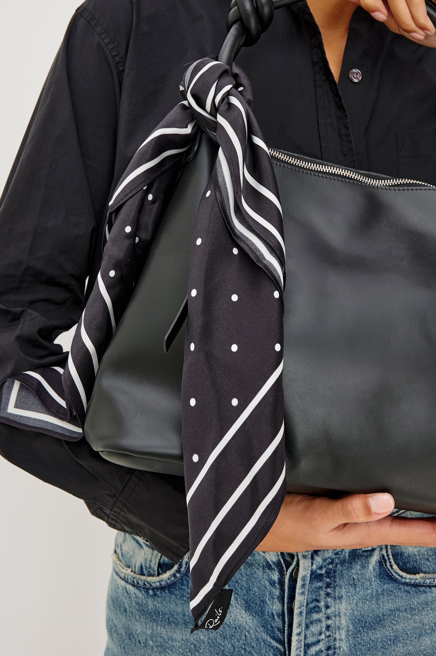 Finna Square Scarf in 100% Silk With Contrast Polka Dots and Striped Outline in Black Colorway - Stylized View Featured on Model