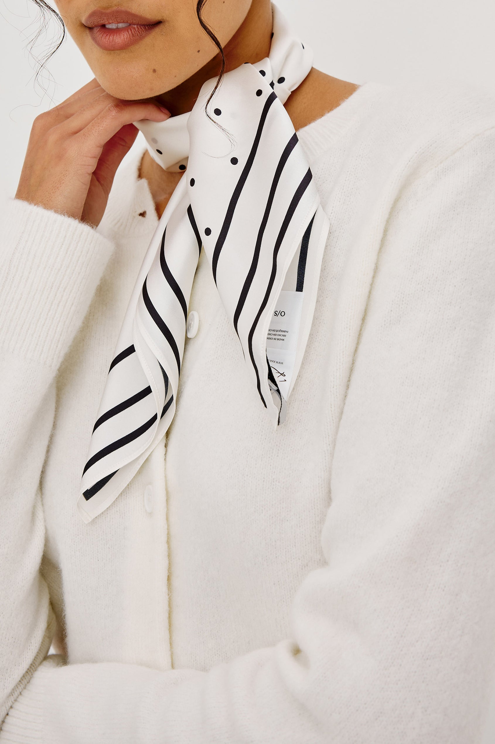 Finna Square Scarf in 100% Silk With Contrast Polka Dots and Striped Outline in White Colorway - front view on model Featured