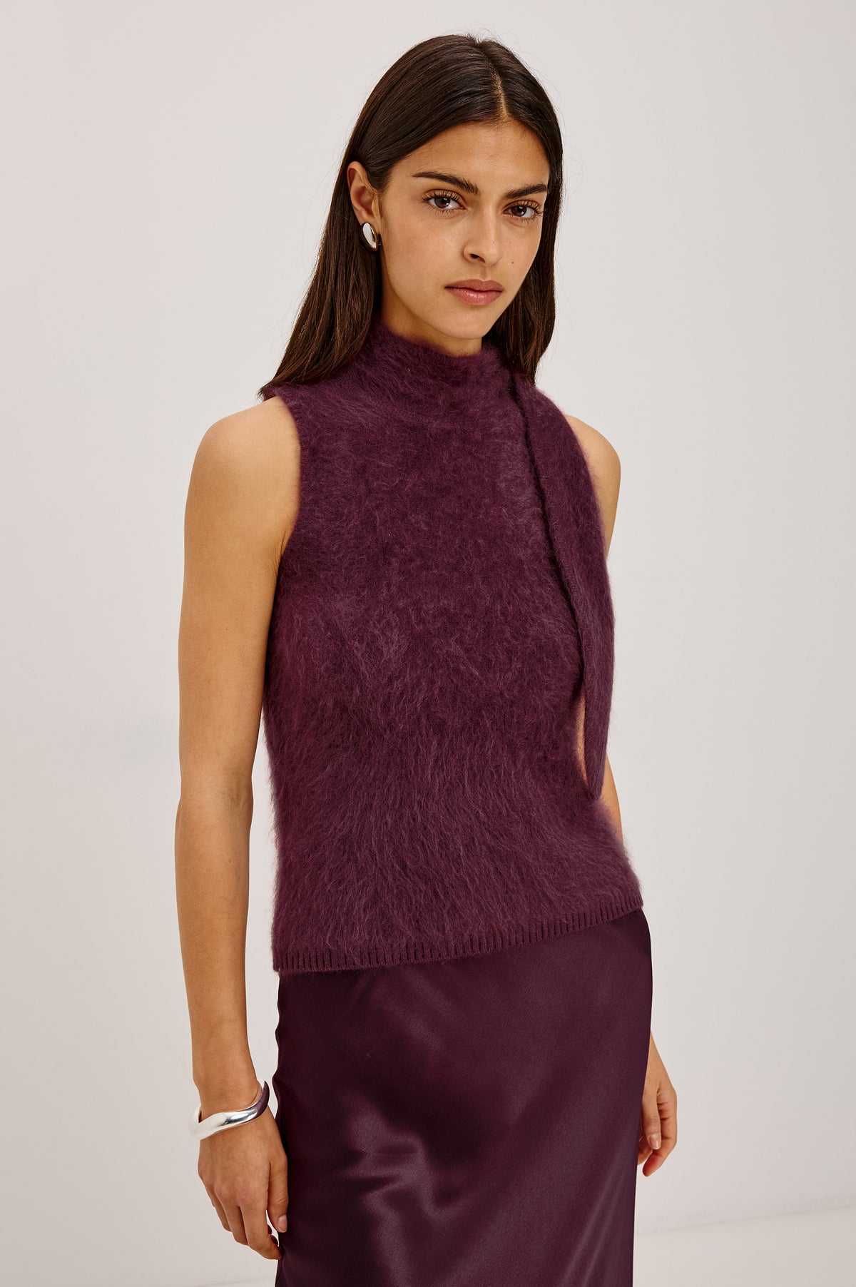 Flora Top in Brushed Knit With Mock Neck, Tie Detail, and Sleeveless Silhouette in Wine Colorway - Front View Featured on Model.