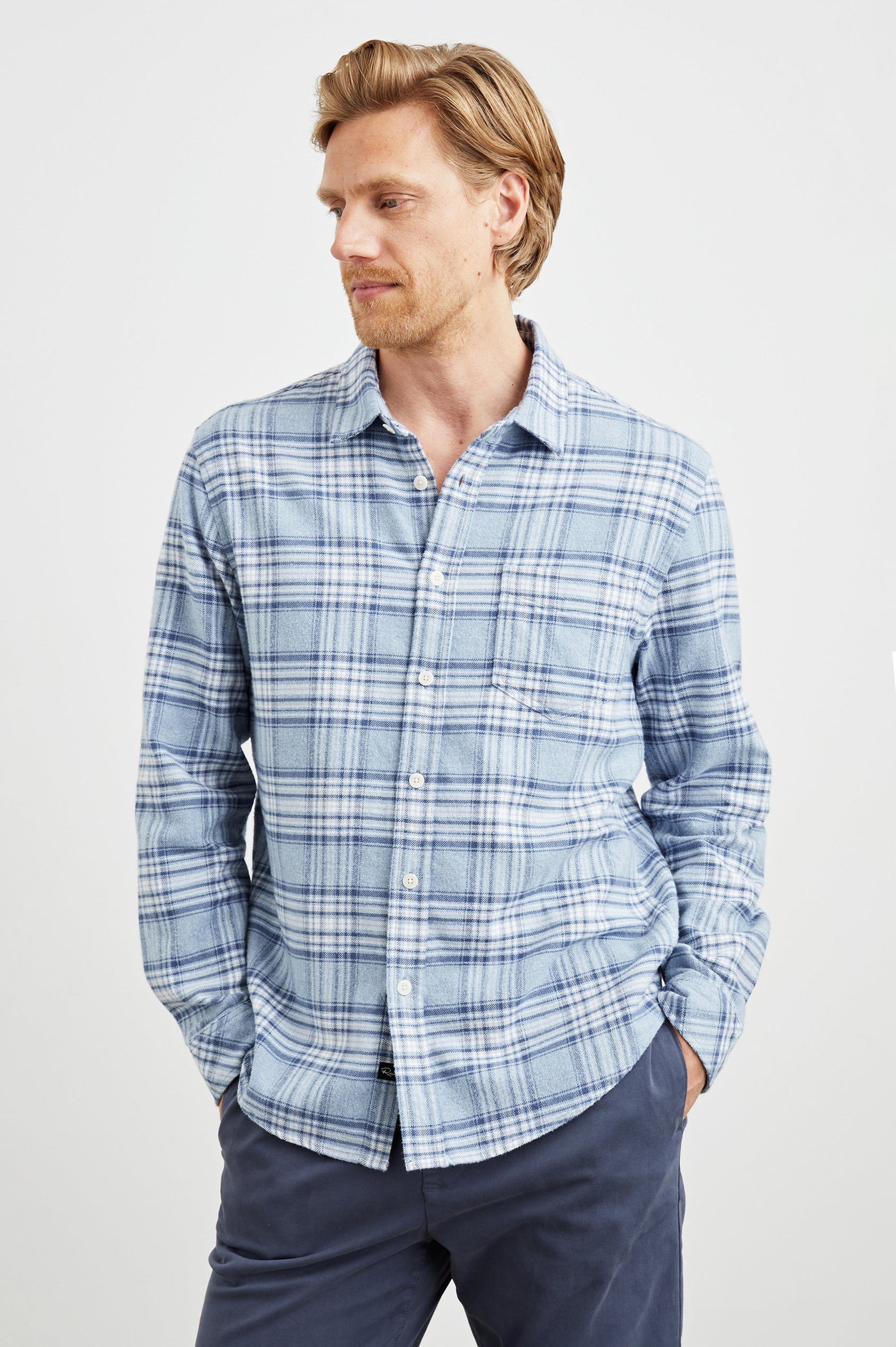 Forrest Long-Sleeve Button Up with a Chest Patch Pocket in Celestial Lagoon Colorway, a Blue and White plaid - Front View Featured on Model