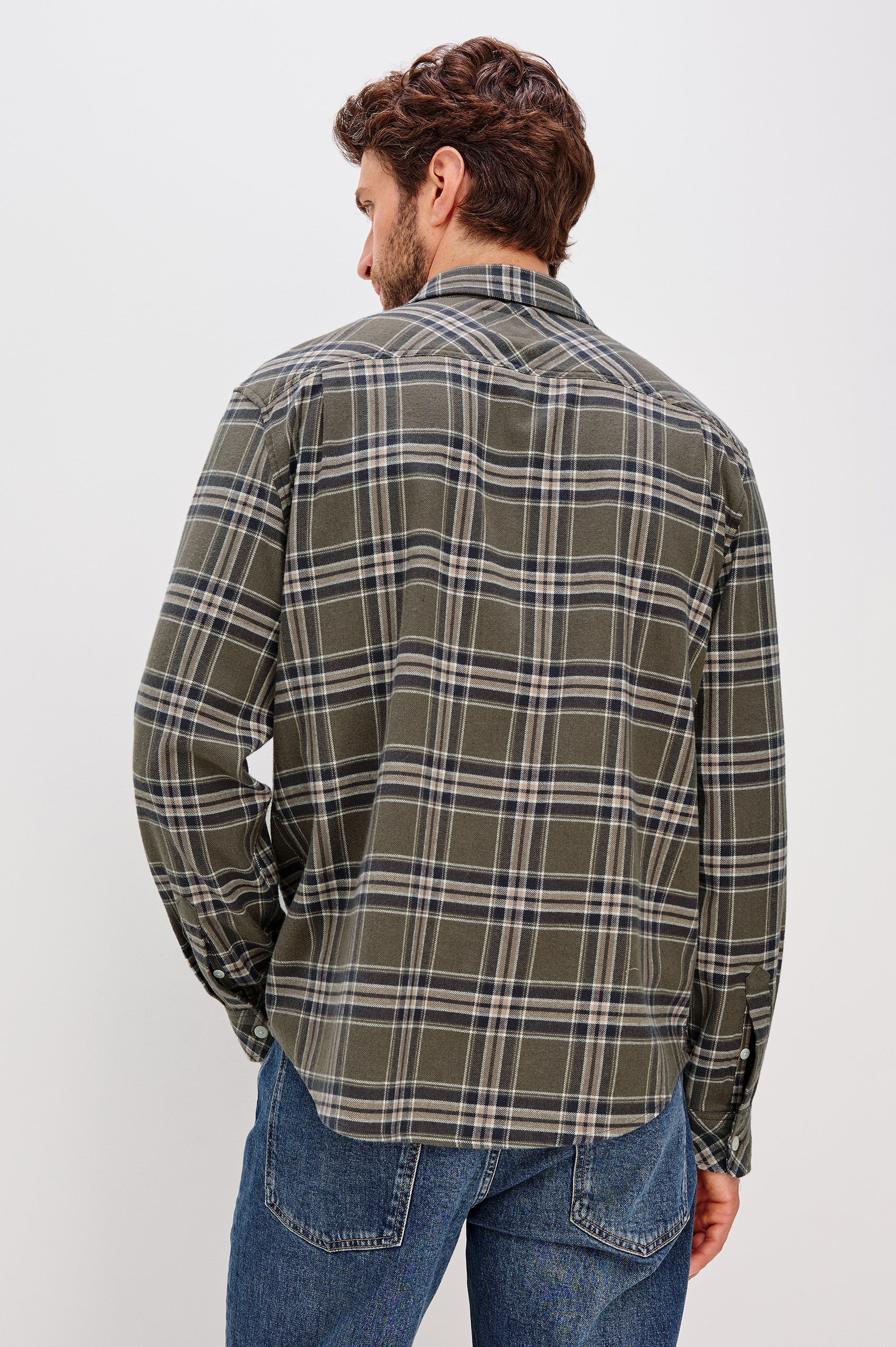 Forrest Long-Sleeve Button Up with a Chest Patch Pocket in Driftwood Coal Colorway, a Brown, Green and Charcoal plaid - Back View Featured on Model