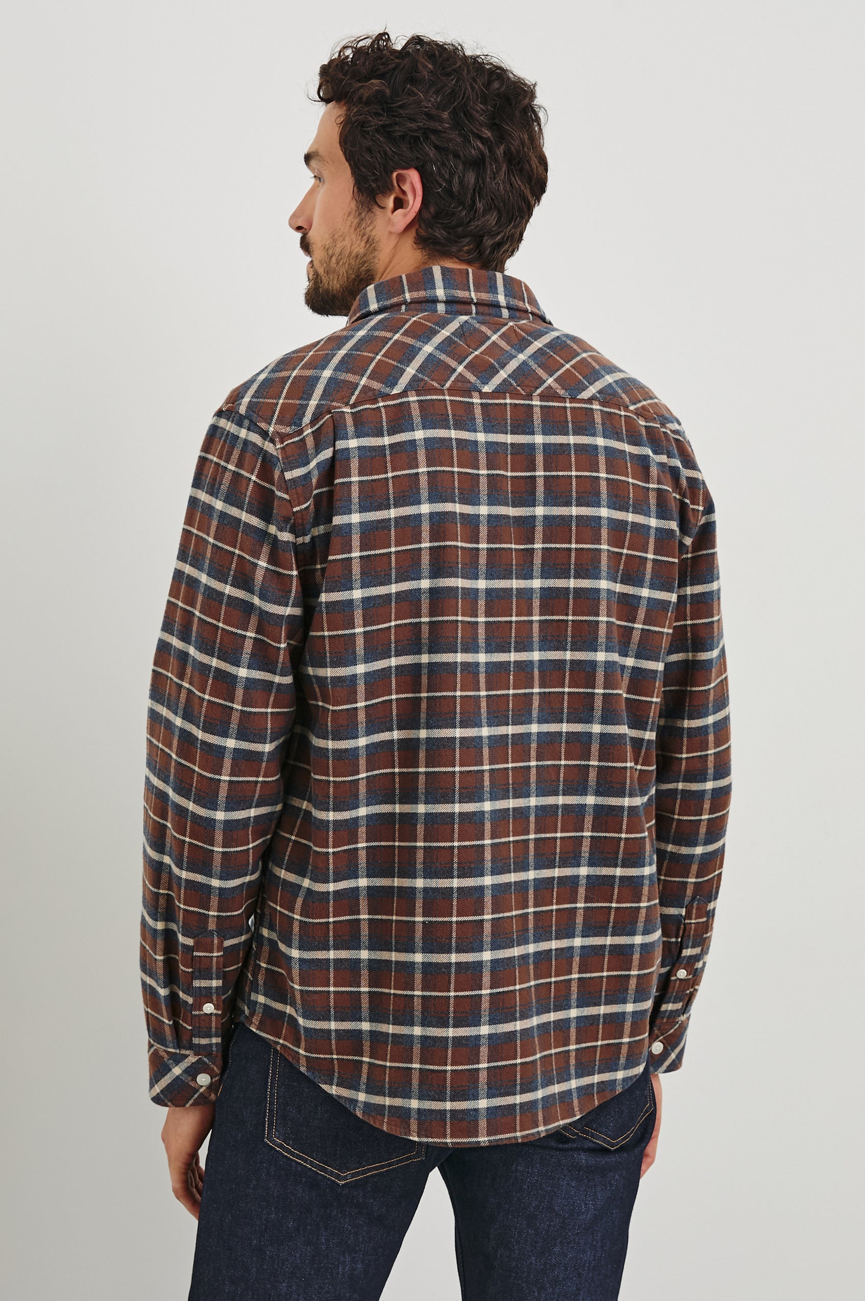 Forrest Long-Sleeve Button Up with a Chest Patch Pocket in Hickory Blue Melange Colorway, a Brown, Blue and White plaid - Back View Featured on Model