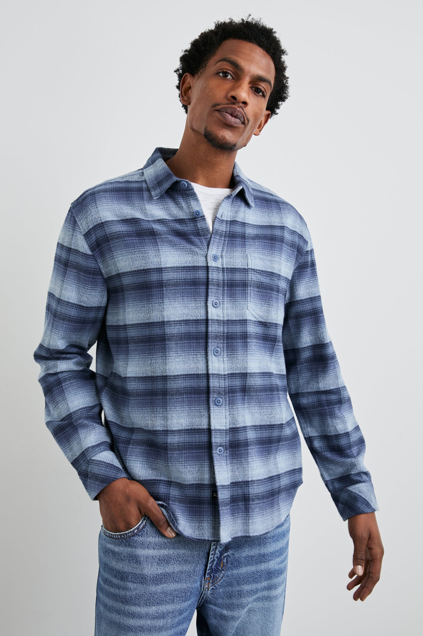 Forrest Long-Sleeve Button Up with a Chest Patch Pocket in Lightning Portal Colorway, a plaid in blues - Front View Featured on Model