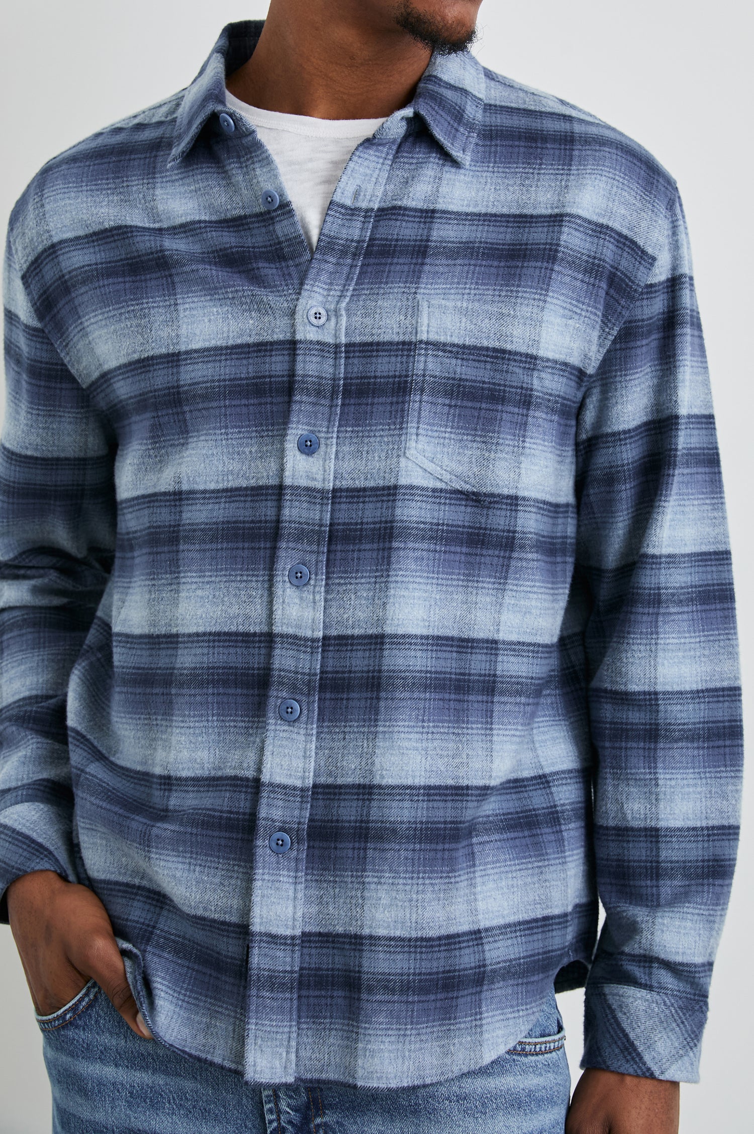 Forrest Long-Sleeve Button Up with a Chest Patch Pocket in Lightning Portal Colorway, a plaid in blues - Front View Featured on Model