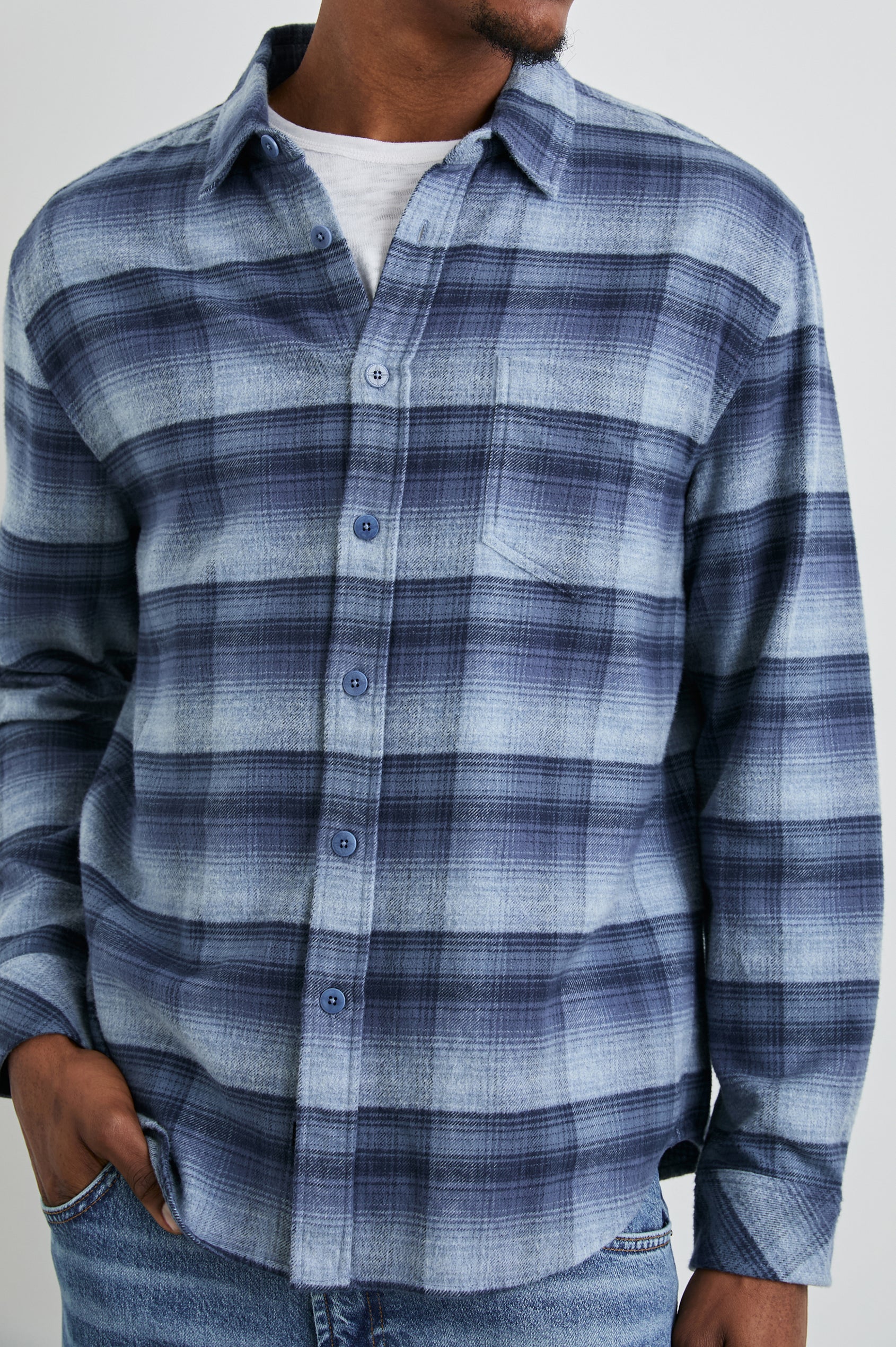Forrest Long-Sleeve Button Up with a Chest Patch Pocket in Lightning Portal Colorway, a plaid in blues - Front View Featured on Model