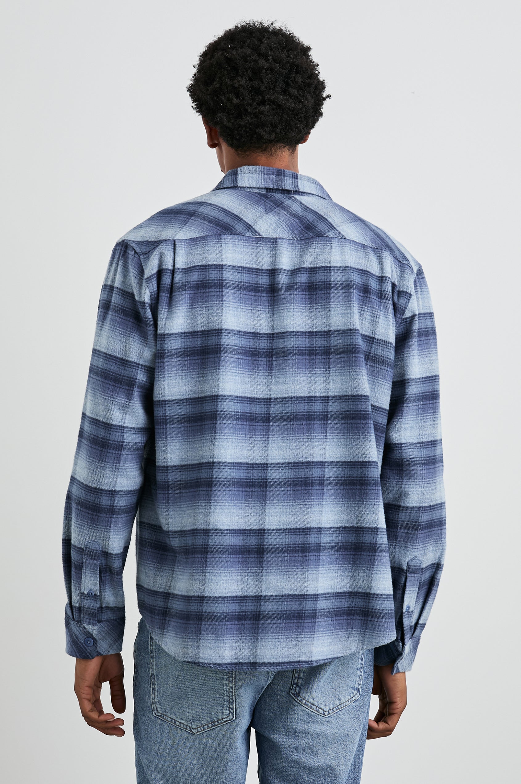 Forrest Long-Sleeve Button Up with a Chest Patch Pocket in Lightning Portal Colorway, a plaid in blues - Back View Featured on Model