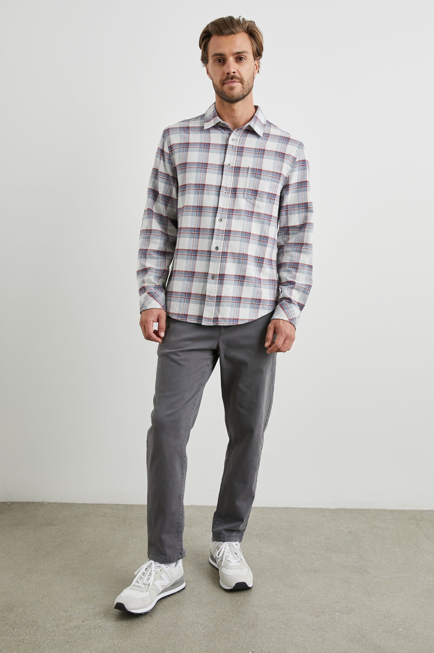 Forrest Long-Sleeve Button Up with a Chest Patch Pocket in Moab Sky Melange Colorway, a plaid in Cream, Blue and Maroon - Front Full Body View Featured on Model