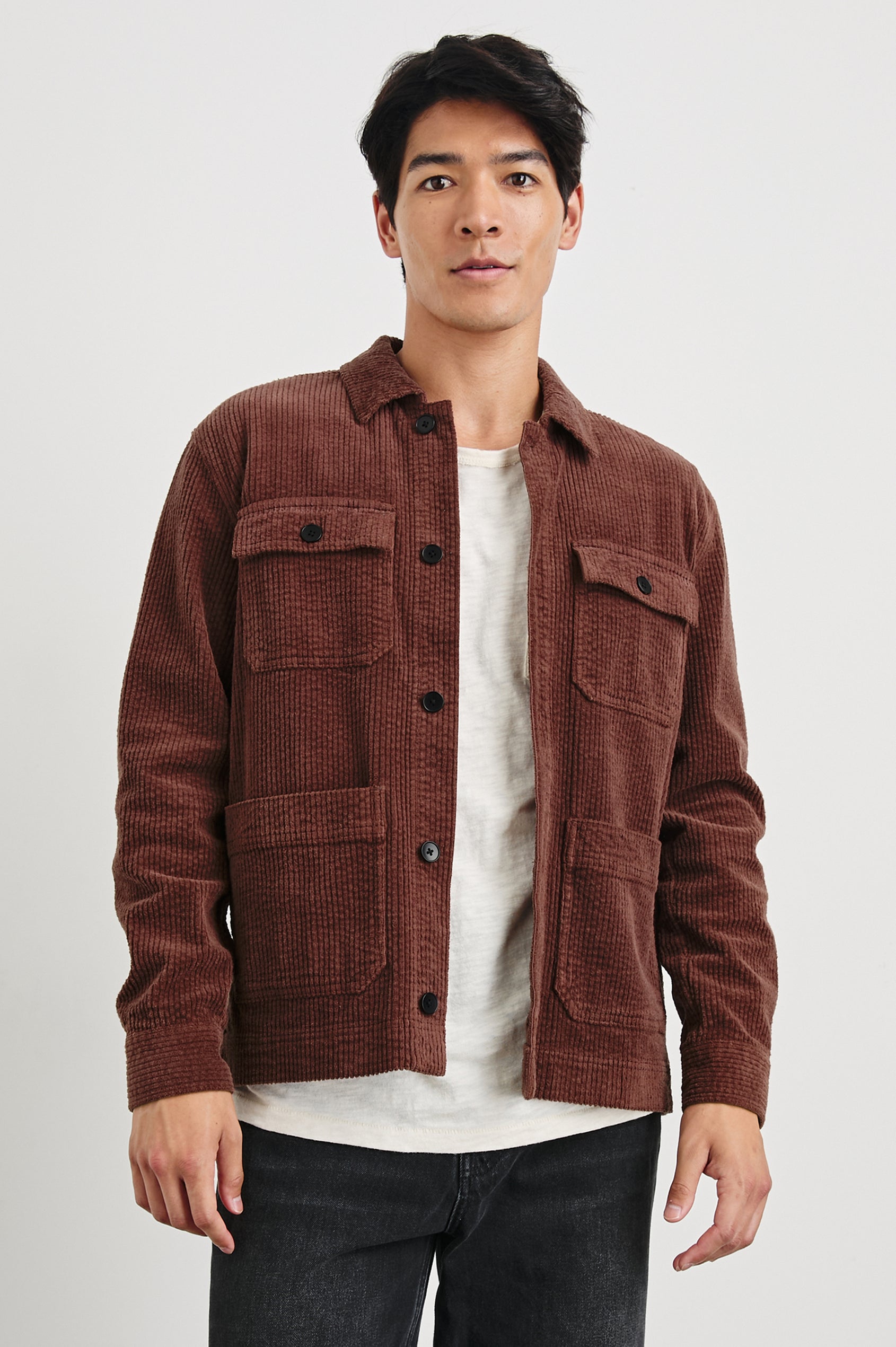 Franklin Corduroy Jacket with Button Closure, Two Front Patch Pockets and Two Chest Button Flap Pockets in Brick Colorway - Front View Featured on Model