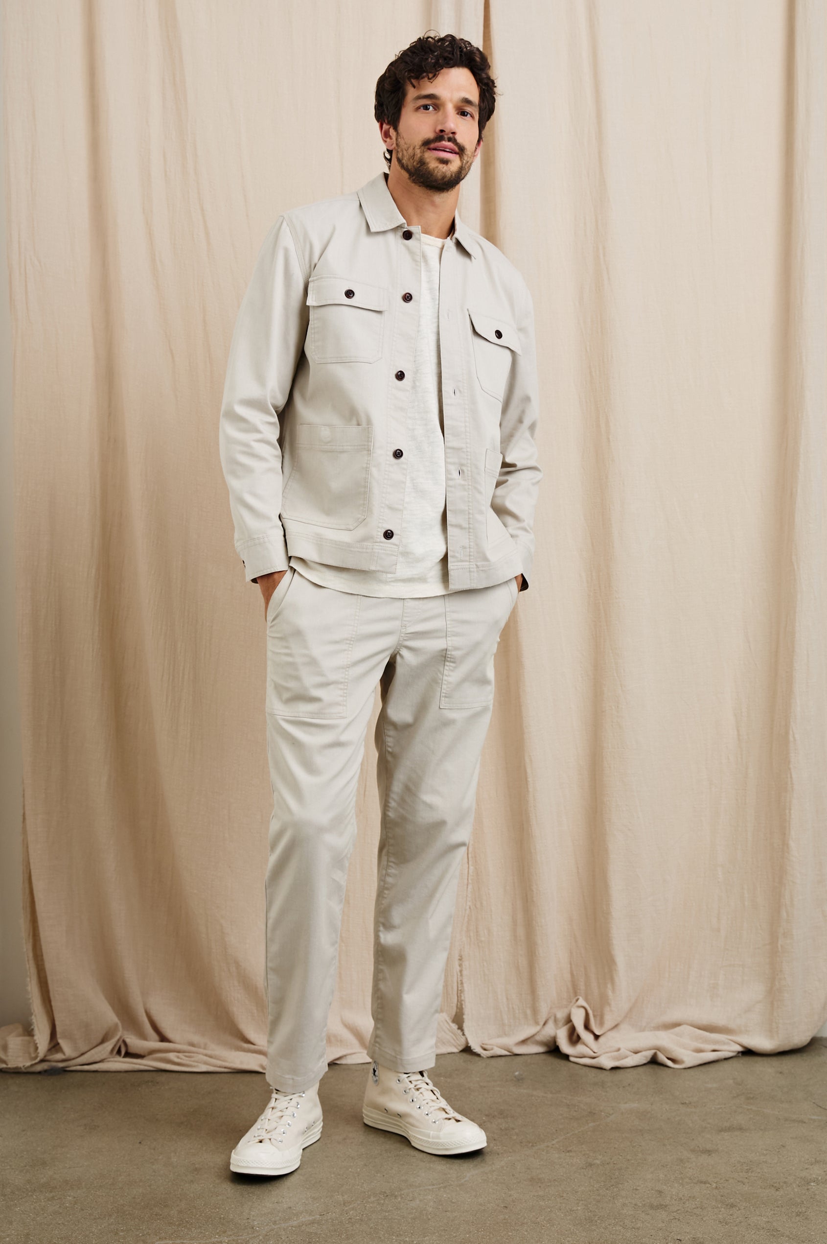 Franklin Jacket with Button Closure, Two Front Patch Pockets and Two Chest Button Flap Pockets in Oat Railroad Dobby Colorway - Front Full Body View Featured on Model