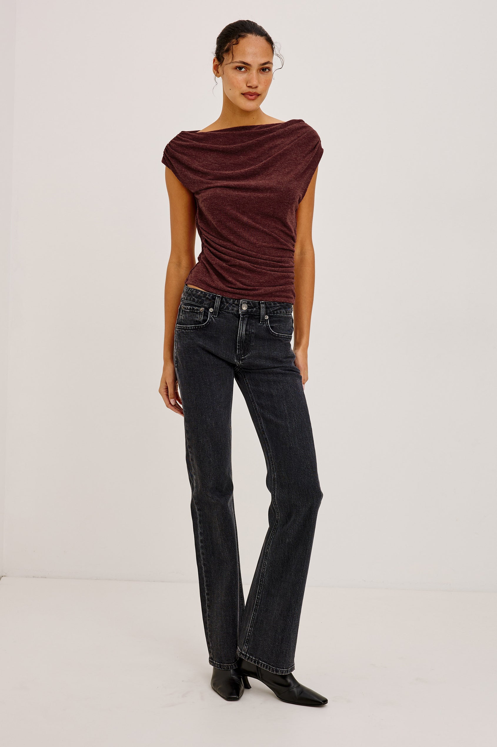 Fremont Low Rise Bootcut Jean in Light Stretch Denim With Extended Inseam, 5-Pockets, Belt Loops, and Zip-Fly Closure in Blackjack Colorway - Full Body Front View Featured on Model