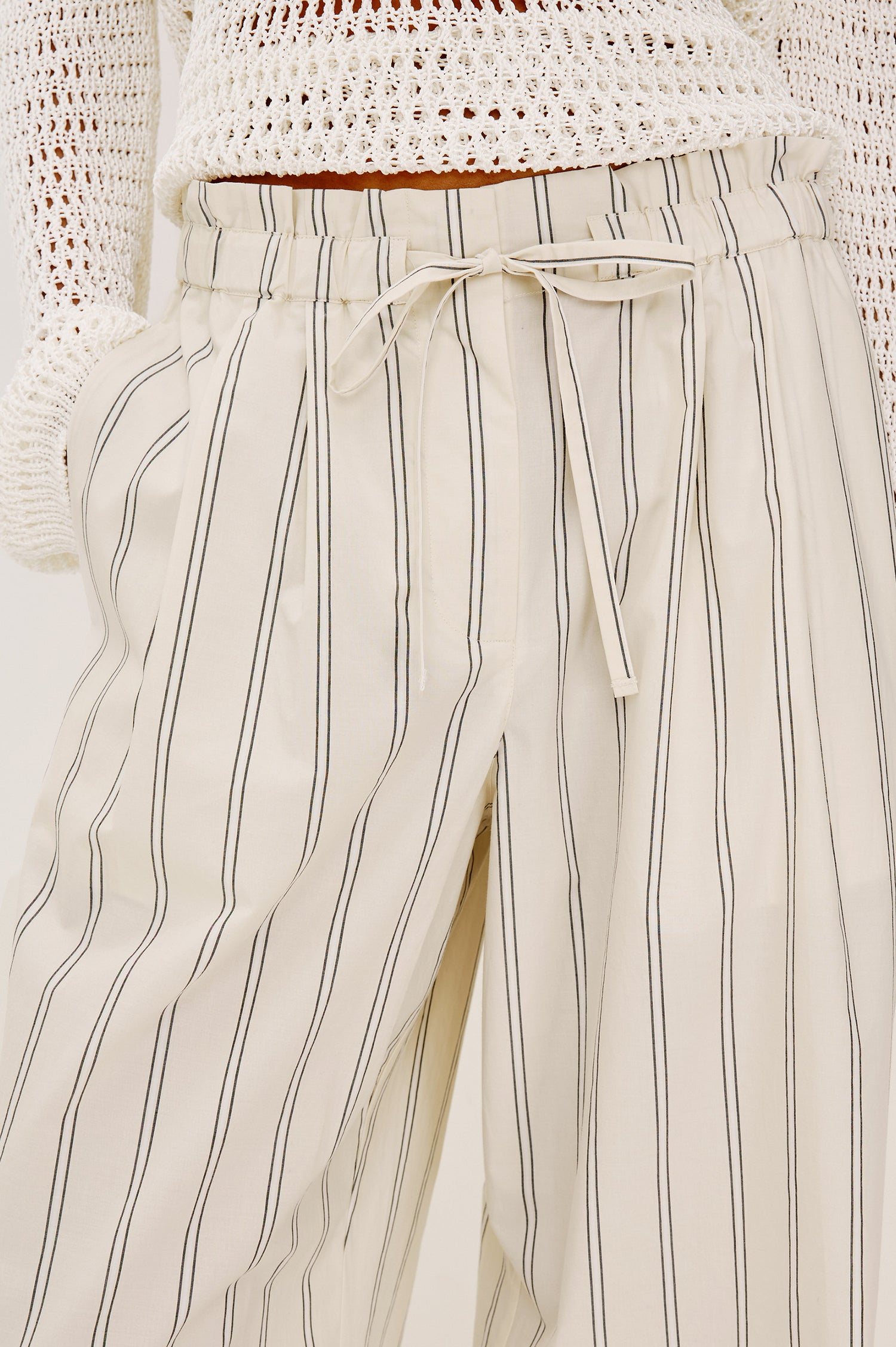 Fulham Pant in Cotton Poplin With Mid-Rise, Pleated Details, Zip Fly, and Back Pockets - Lower Body Front View Featured on Model