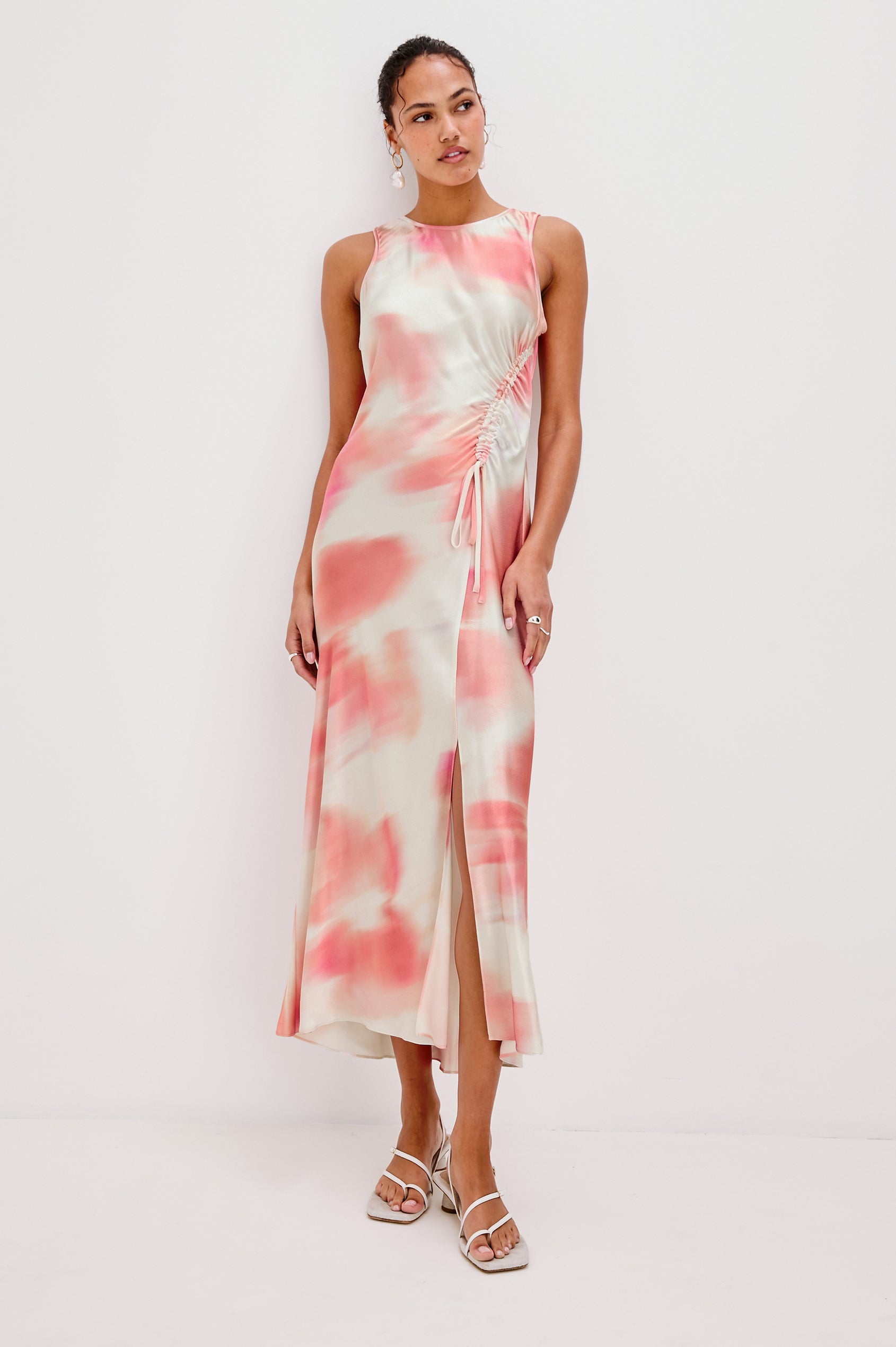 Gabriella Midi Sleeveless Dress with One Side Curved Drawstring Detail and Front Slit in Cherry Blossom Colorway. Full Body Front View Shown on Model.