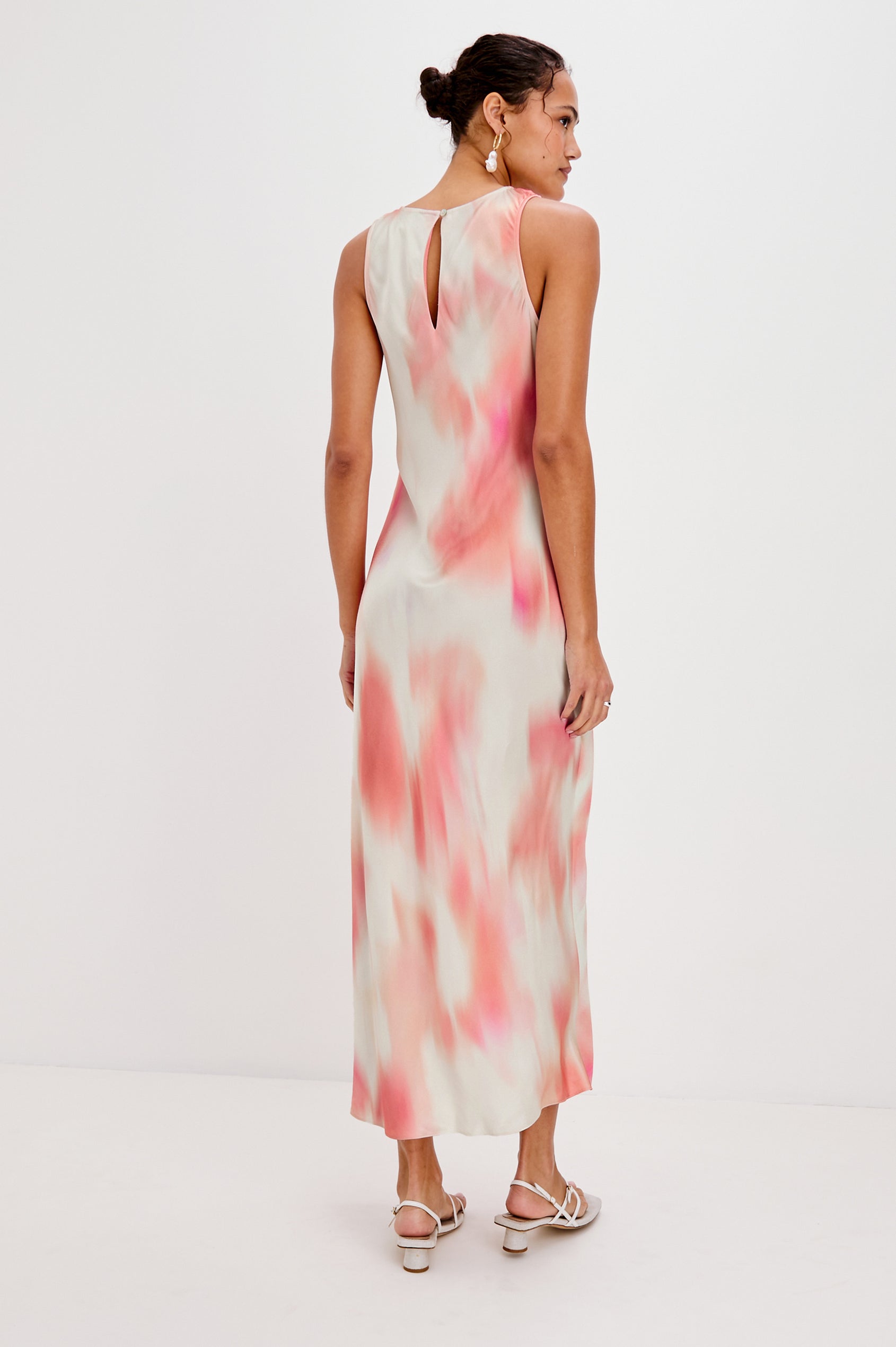 Gabriella Midi Sleeveless Dress with One Side Curved Drawstring Detail and Front Slit in Cherry Blossom Colorway. Full Body Back View Shown on Model.