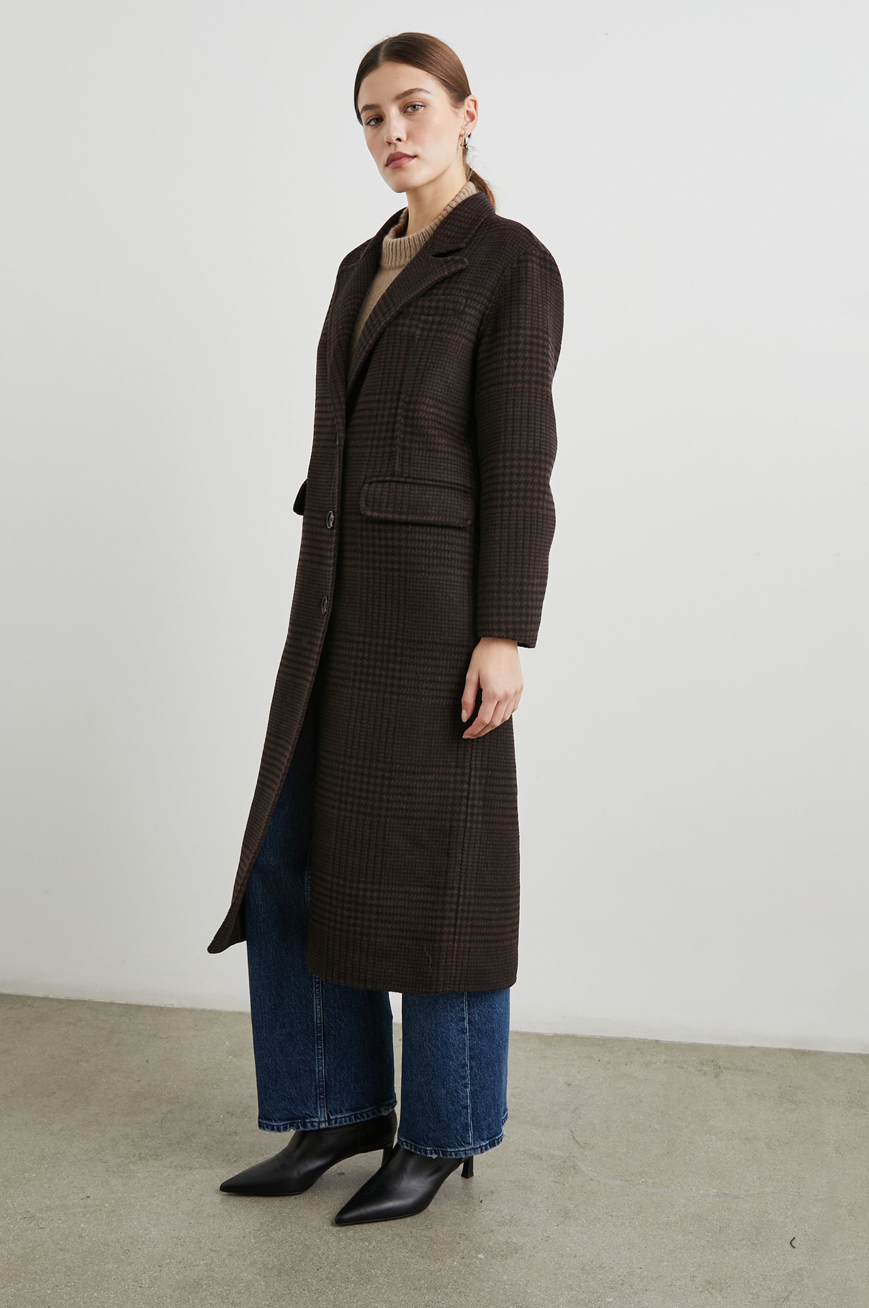 Gallery Below-the-Knee Coat with Three-Button Closure, Notched Lapels, and Two Front Flap Pockets in Espresso Houndstooth Colorway - Front Full Body View Featured on Model
