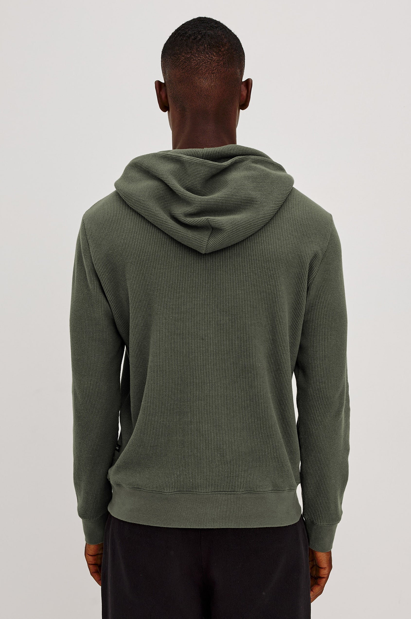 Gates Hoodie in Micro-Waffle Cotton Blend With Fixed Hood, Long Sleeves, and Relaxed Fit in Pine Needle Colorway - Upper Body Back View Featured on Model