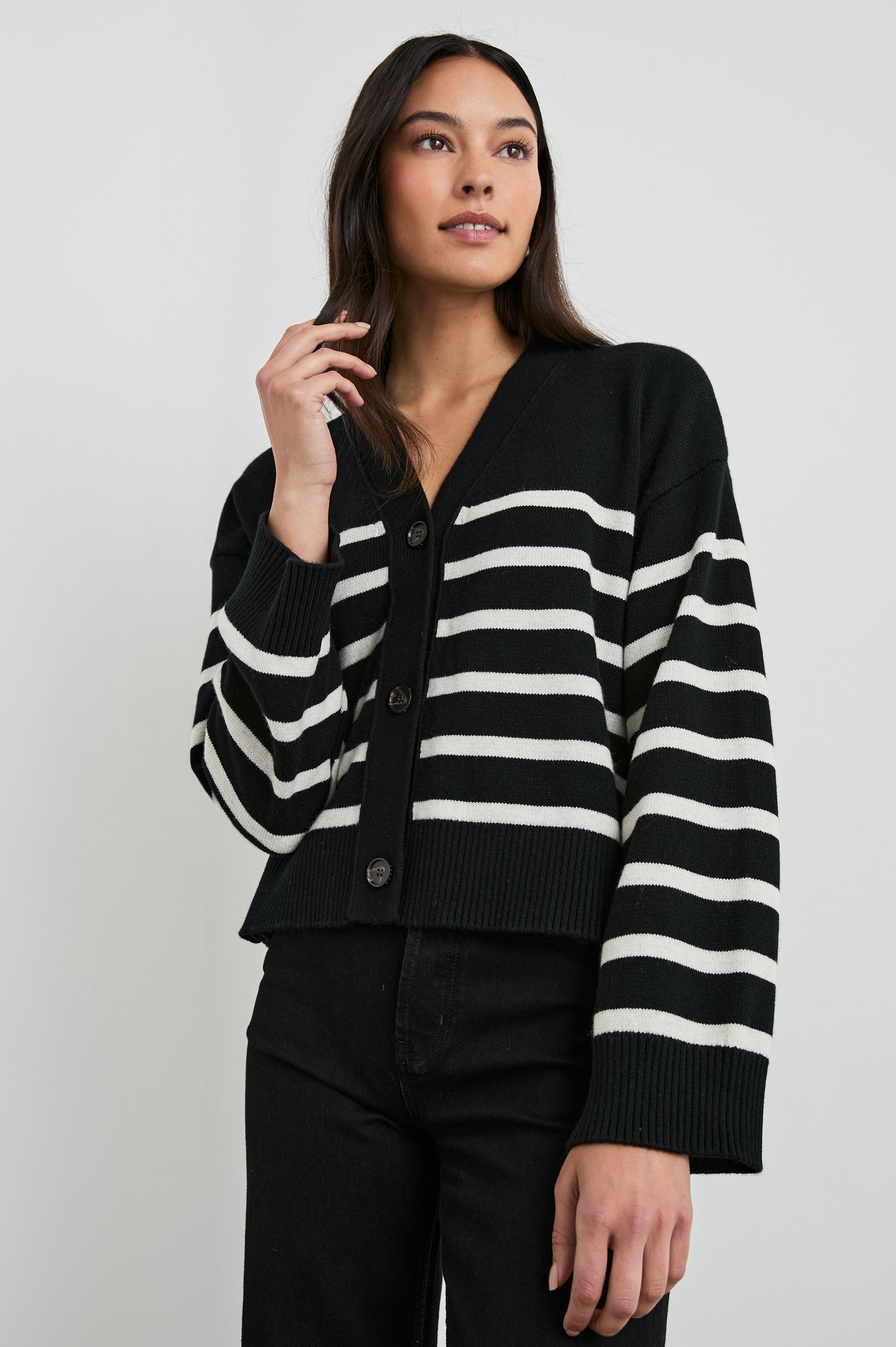 Geneva Long-Sleeve Cardigan with Button Closure and Ribbed Cuffs and Hem in Black Oatmeal Stripe Colorway - Front View Featured on Model