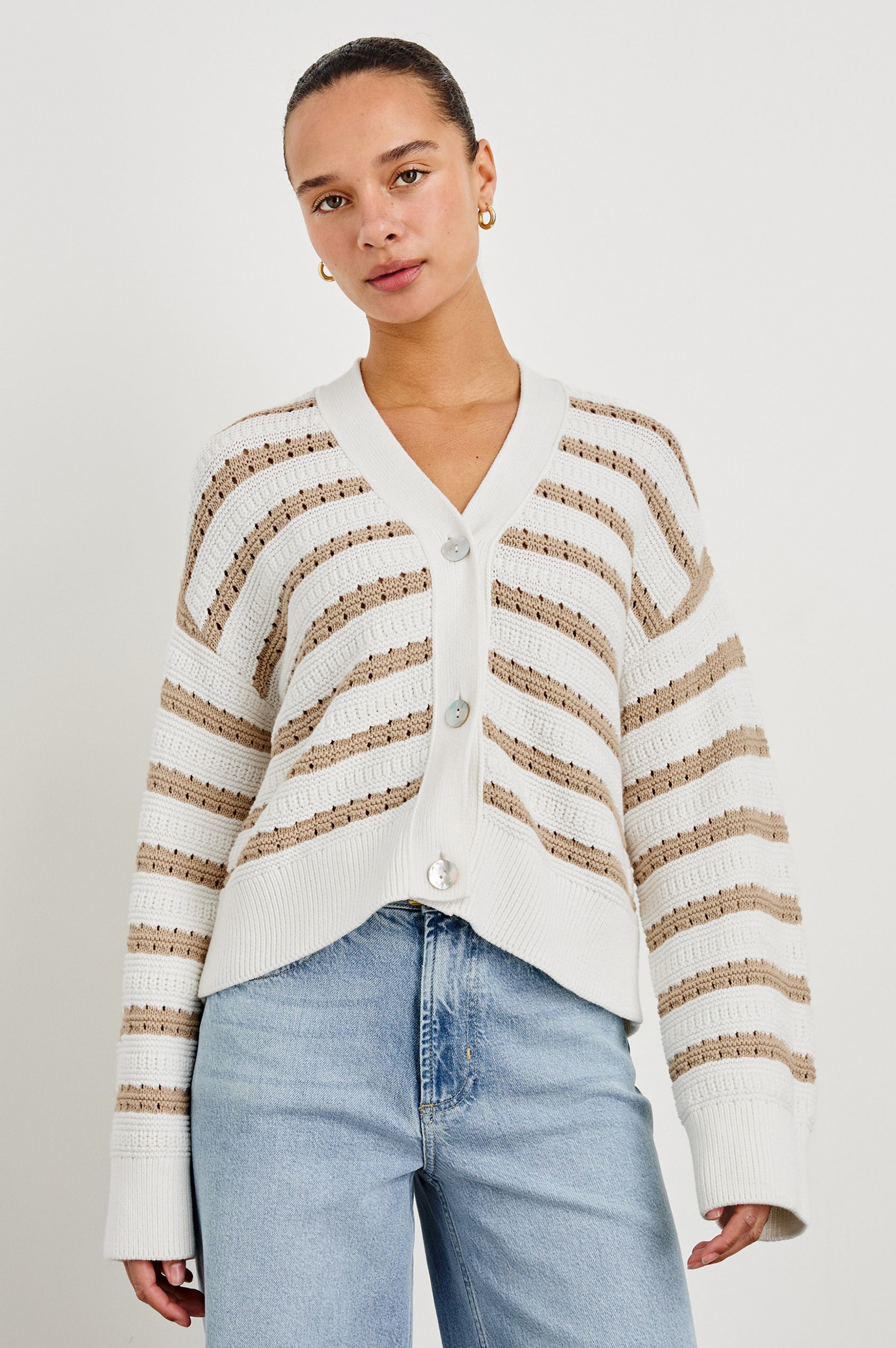 Geneva cropped cardigan sweater with front buttons and contrast trimmings in Ivory Oat Stripe -  front view on model