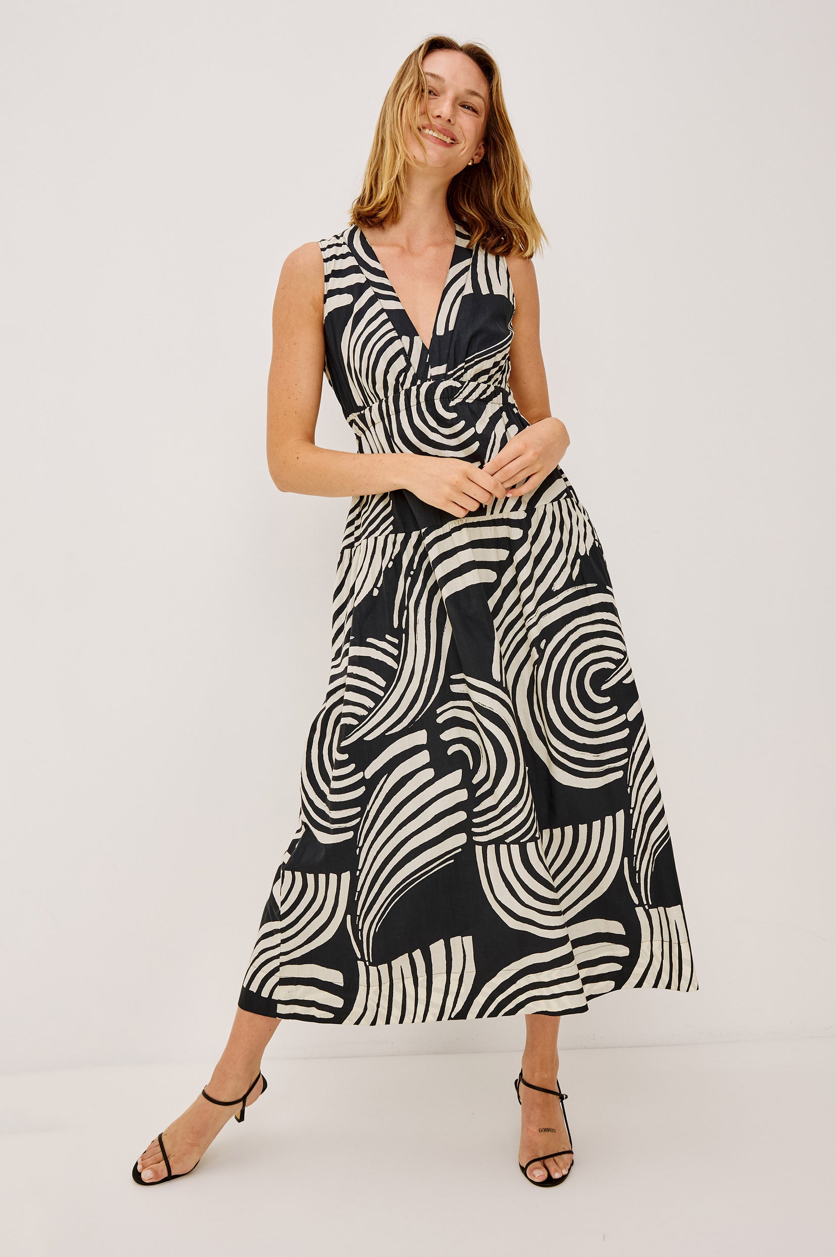 Genevieve Maxi Dress in Cotton Voile With A-Line Silhouette, V-Neckline, Wide Elastic Underbust, Back Cutout, Full Lining, and Side Pockets in Onyx Waves Colorway - Full Body Front View Featured on Model