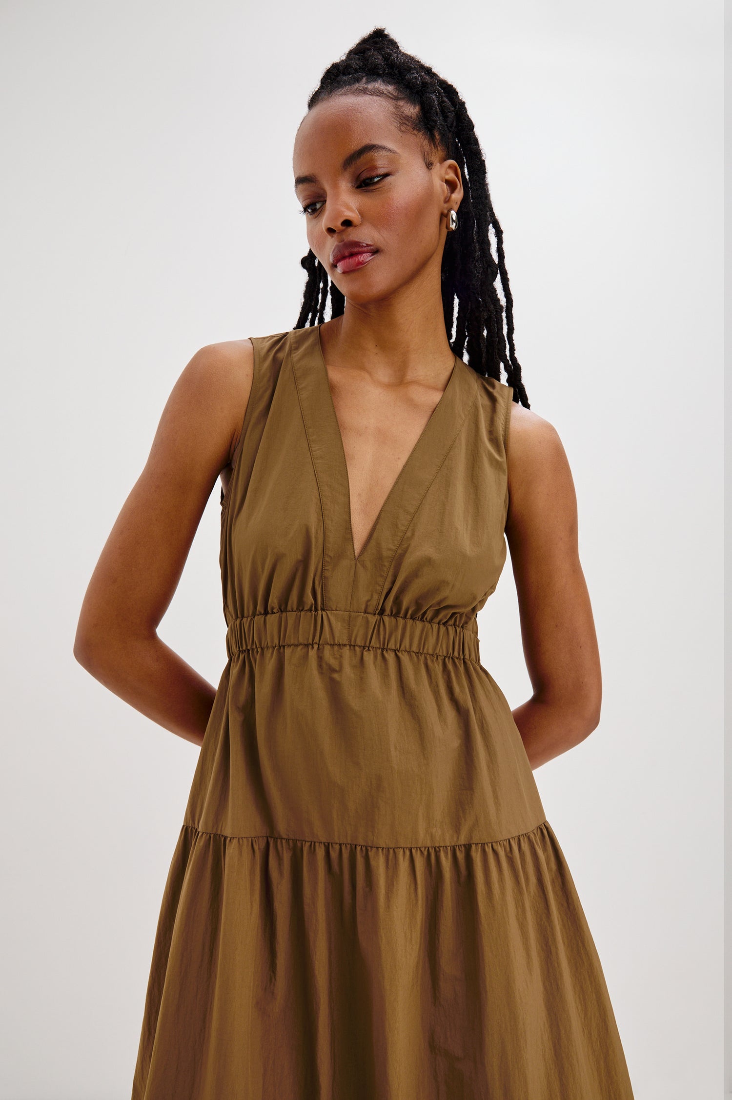Genevieve Midi Tank Dress with a V-Neck, Elastic Waistband, Cutout at Back Waist and Side Seam Pockets in Sepia Colorway. Front Detailed View Shown on Model.