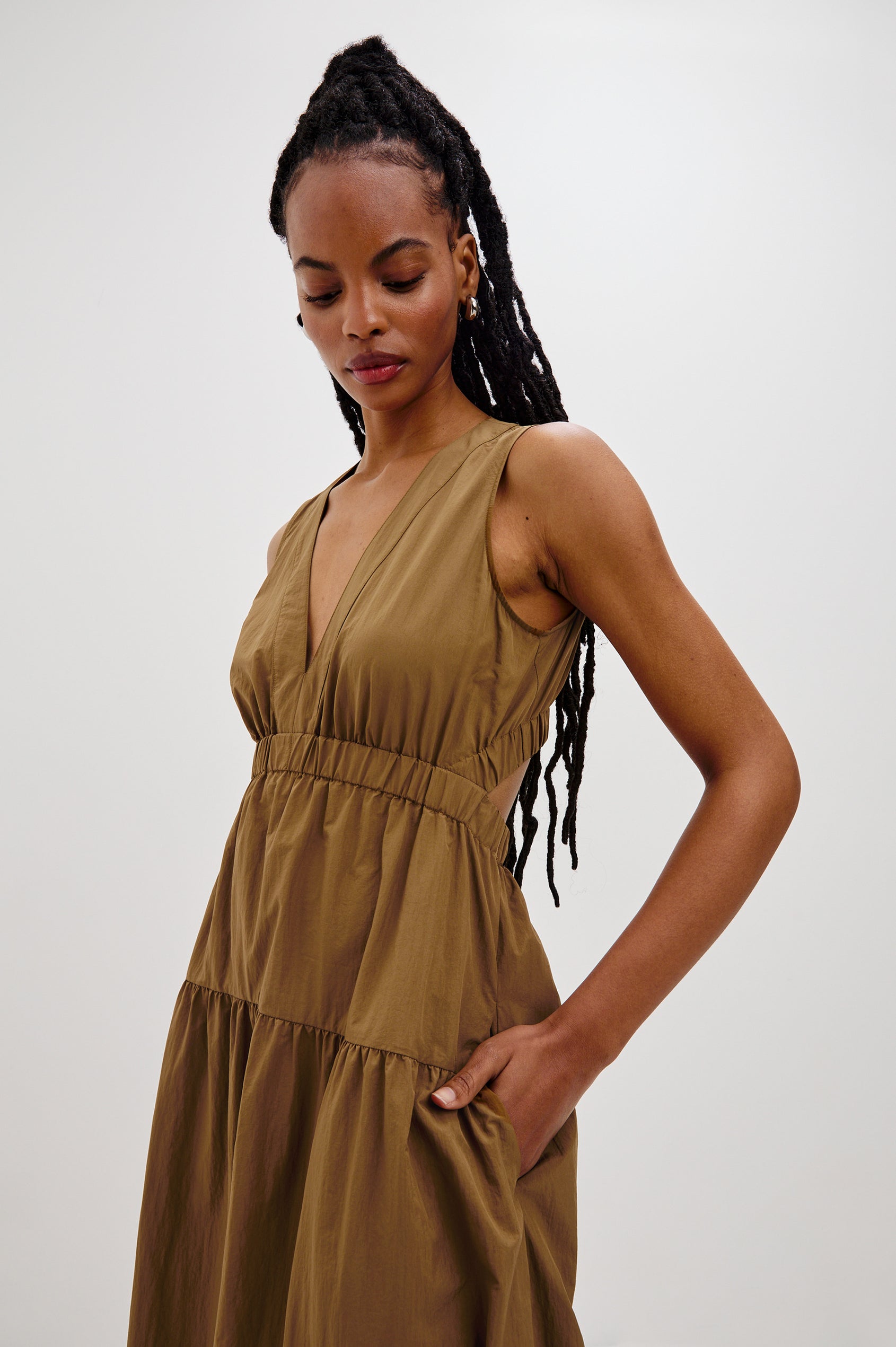 Genevieve Midi Tank Dress with a V-Neck, Elastic Waistband, Cutout at Back Waist and Side Seam Pockets in Sepia Colorway. Front View Shown on Model.