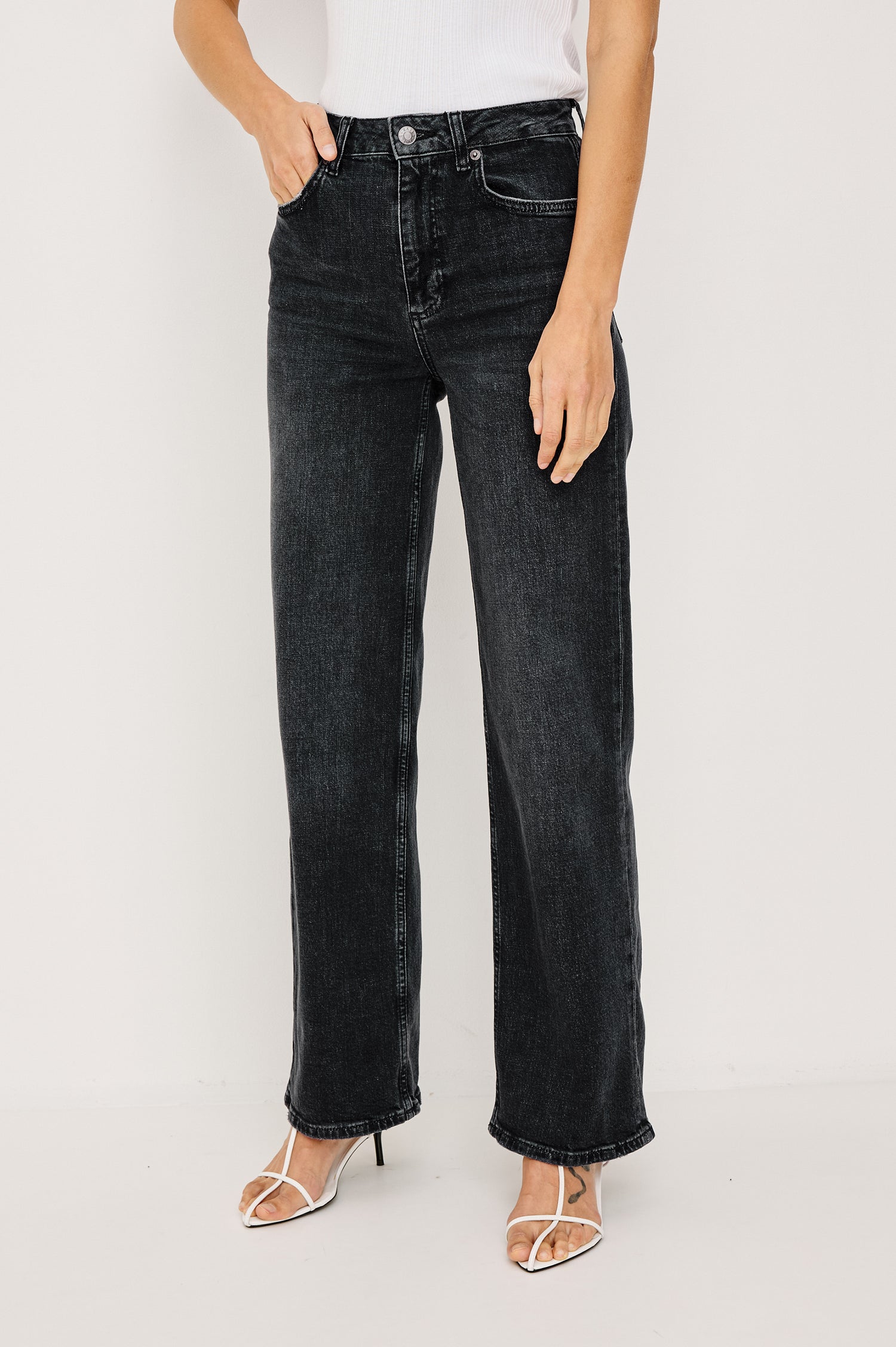 Getty Wide Leg Jean in Dark Wash Denim With High-Rise High-Waisted Fit, Front Button Fly, 5-Pocket Styling in Black Pearl Colorway - Lower Body Front View Featured on Model