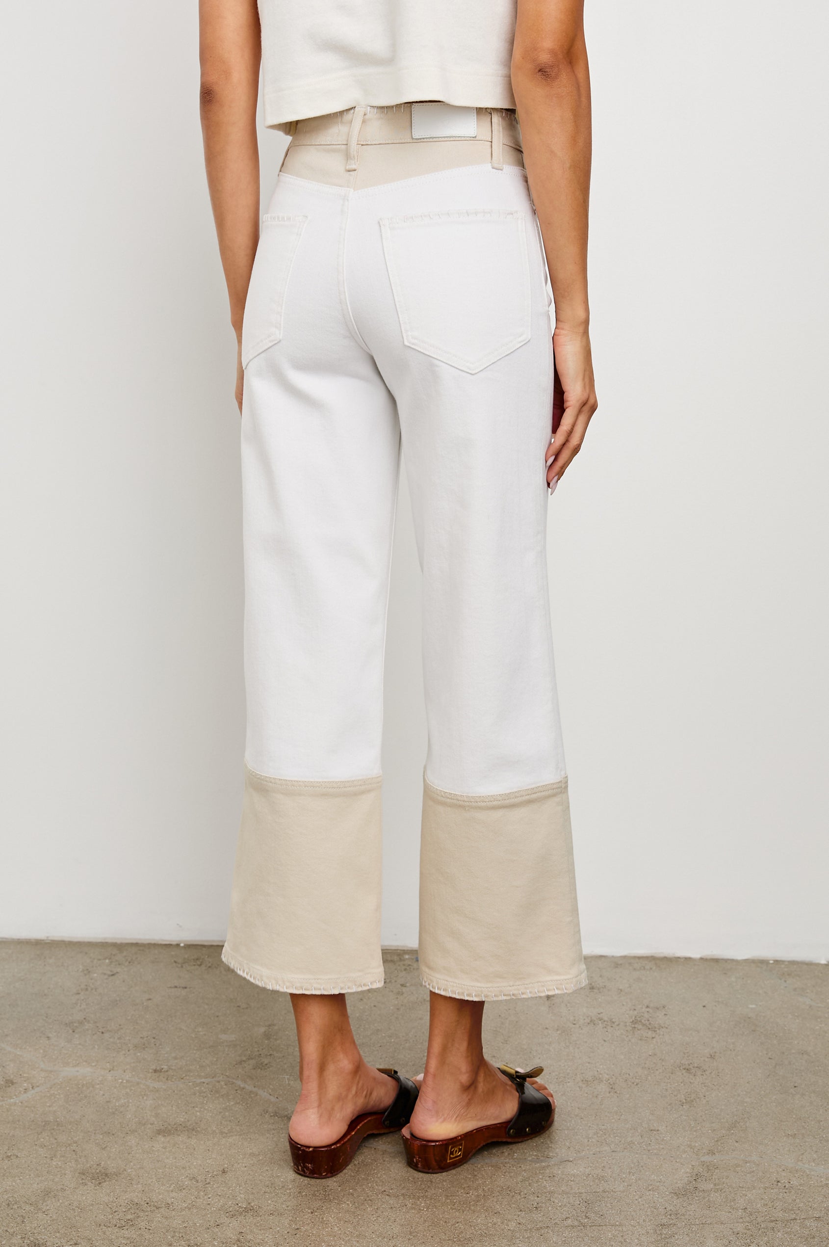 Getty cropped wide leg jean with blanket stiching and dual tones in Crema Embroidered - back view on model