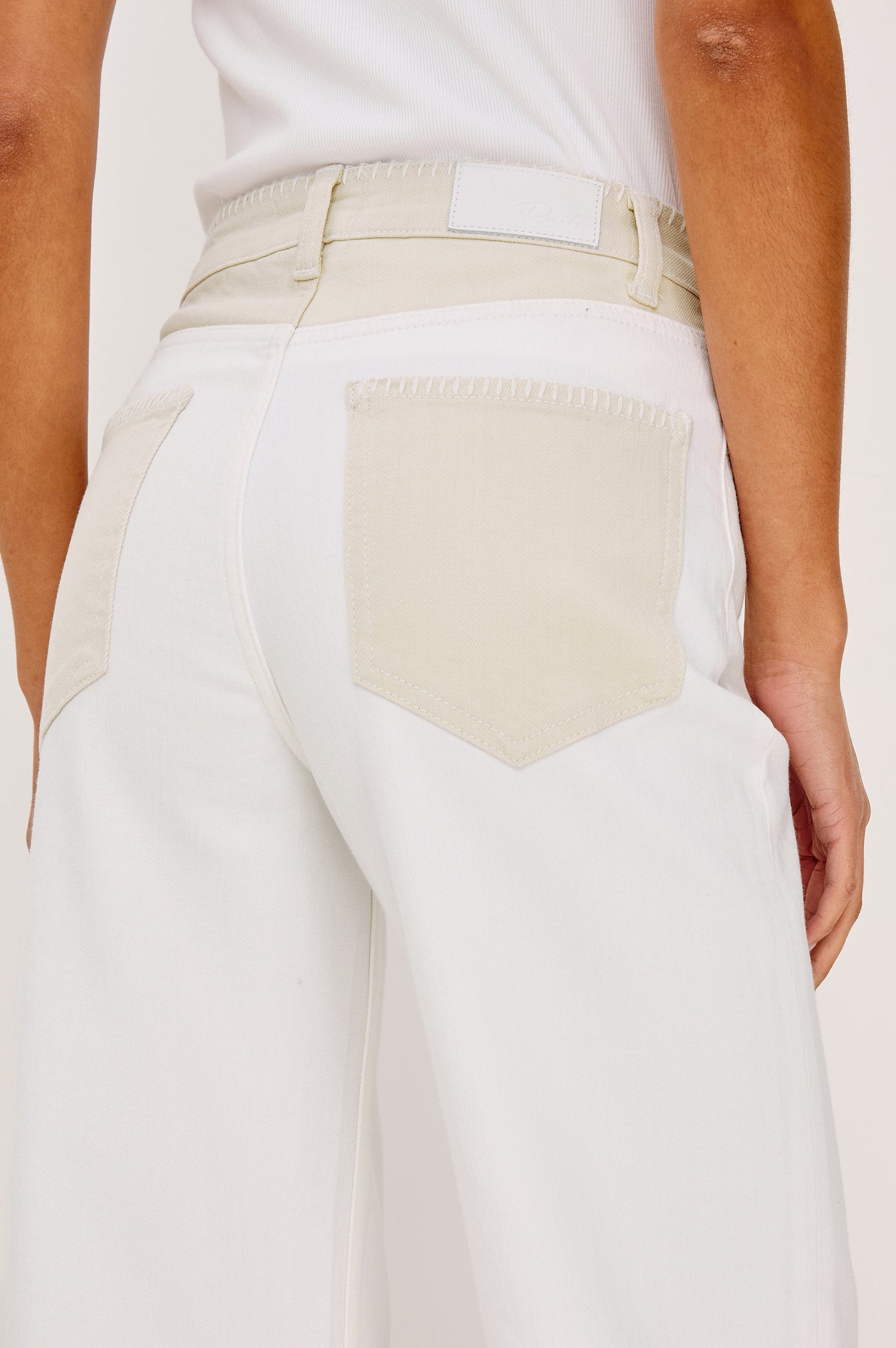 Getty cropped wide leg jean with blanket stiching and dual tones in Crema Embroidered - close up of details on model