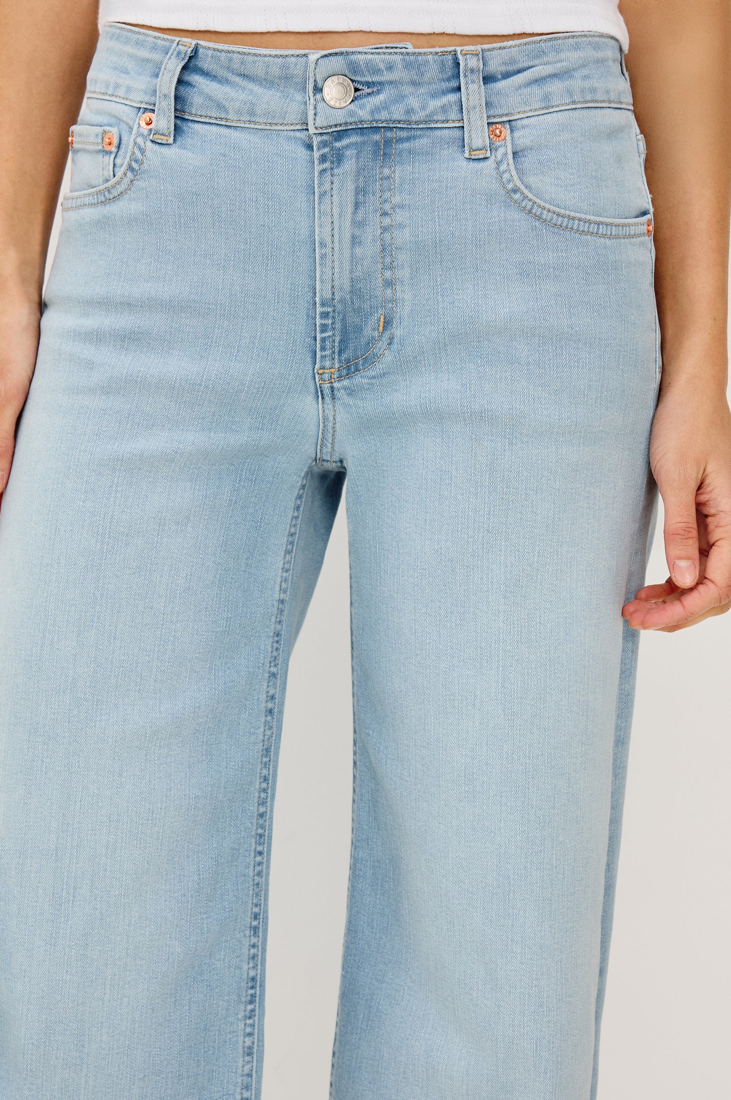 Getty Wide Leg Crop Jean in Light Stretch Denim With Wide Straight Legs, 27″ Inseam, 5-Pockets, and Front Button Fly in Low Rise Seaport Colorway - Lower Body Front Close Up View Featured on Model
