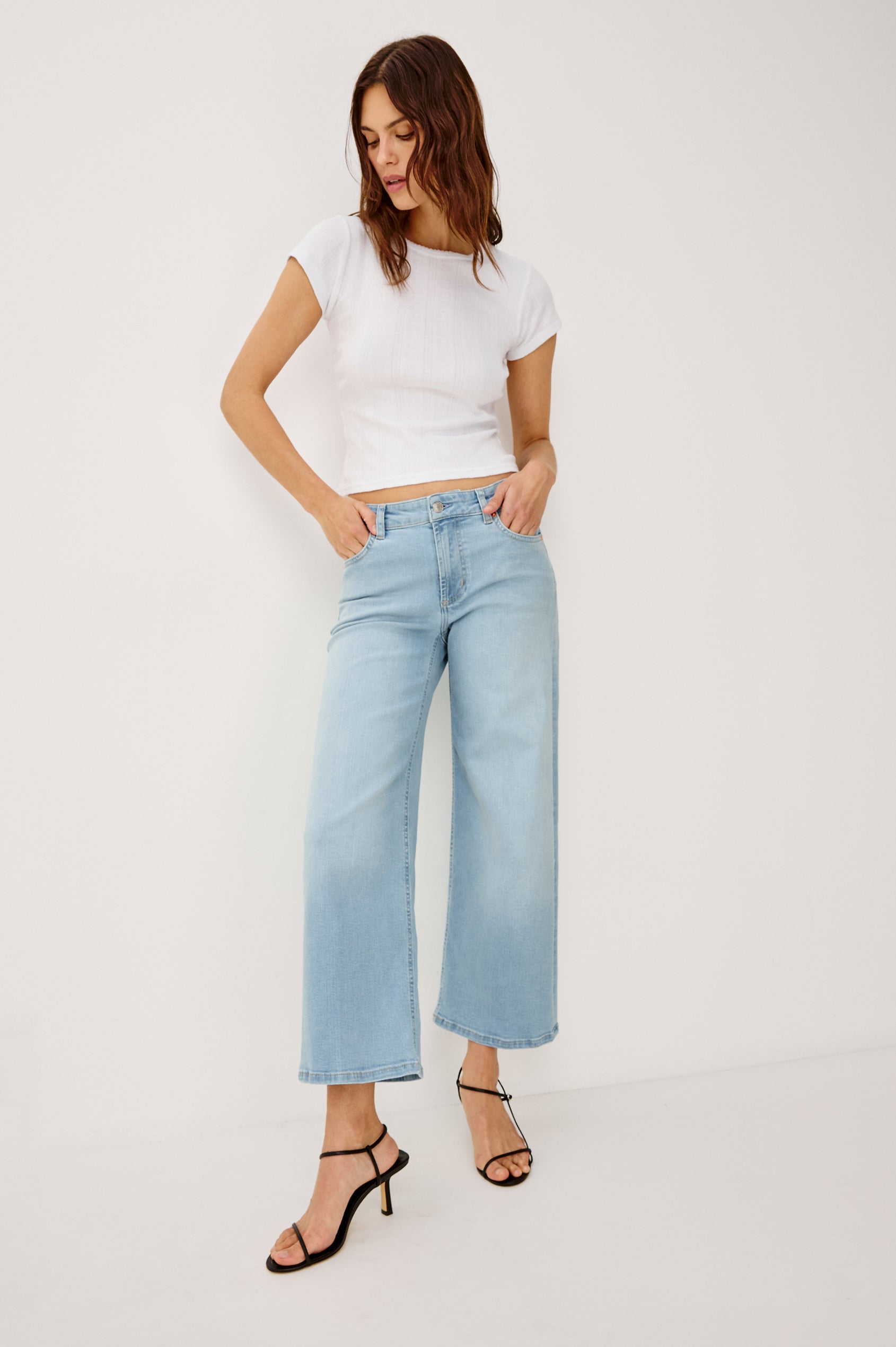 Getty Crop Low Rise Wide Straight Leg Jean in High Stretch Cotton Denim With 27" Inseam, Zip Fly, and 5-Pockets in Seaport Colorway - Full Body Front View Featured on Model