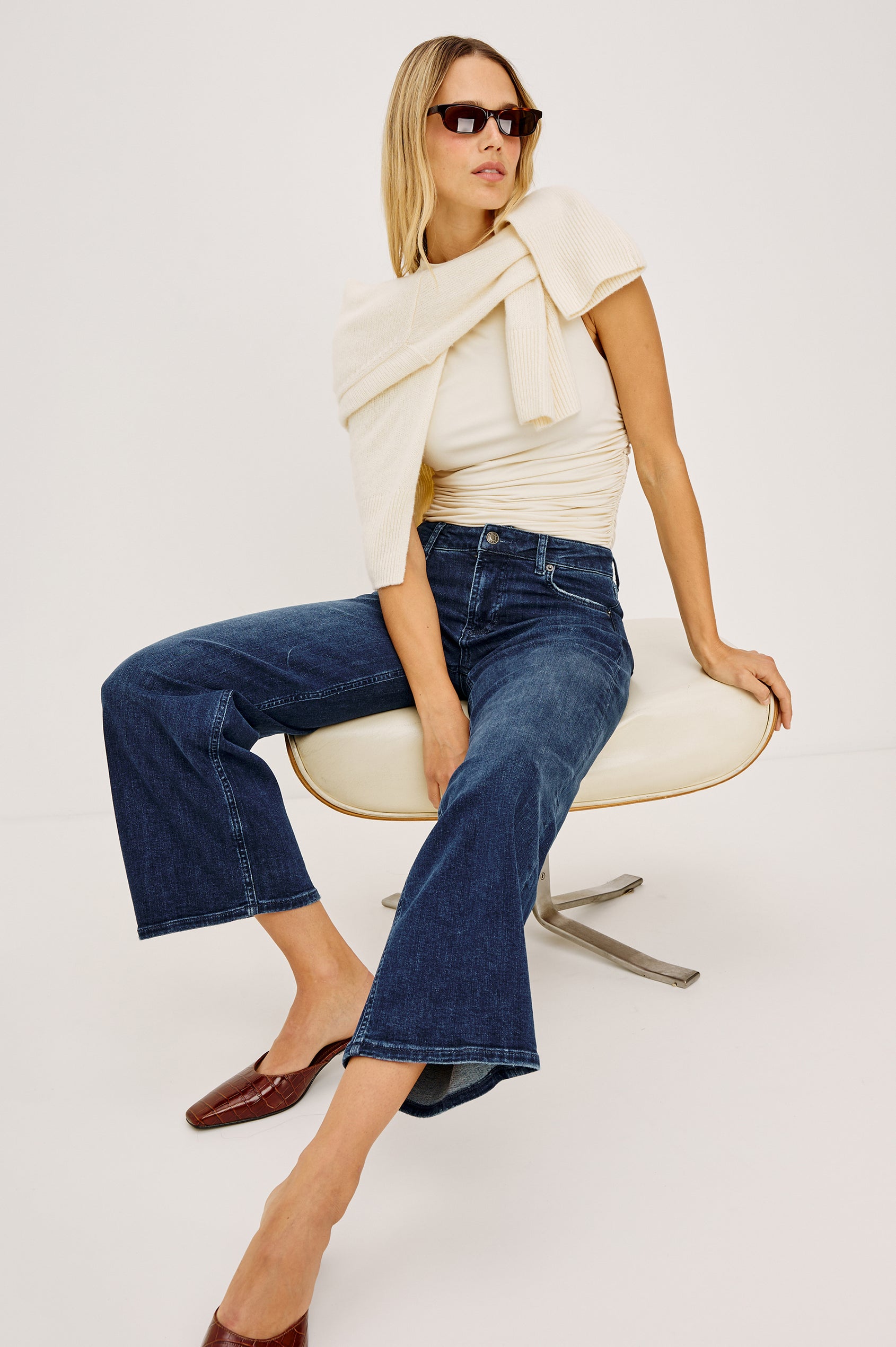 Getty Crop Low Rise Jean in Light Stretch Denim With Wide Legs and 5-Pockets in After Midnight Colorway - Full Body View Featured on Model Stylized