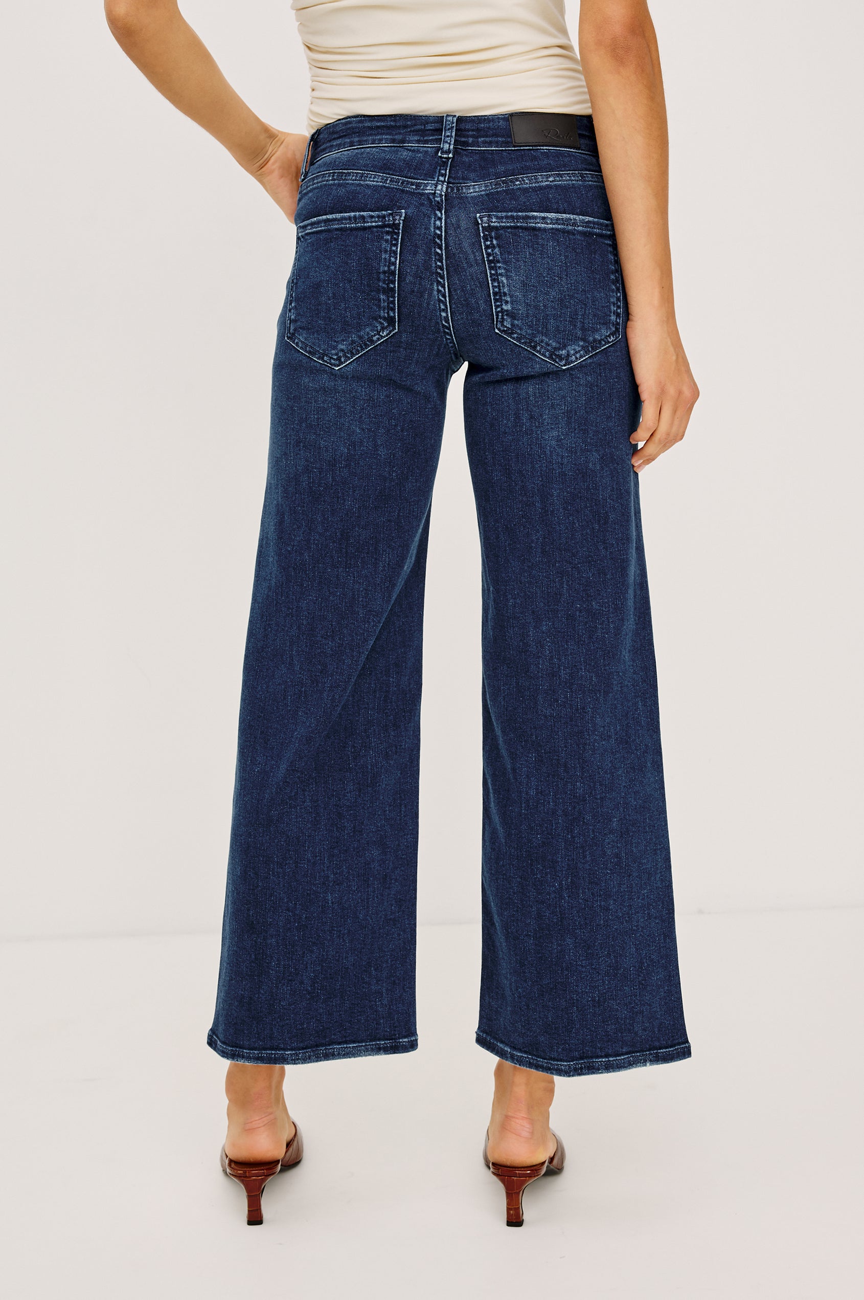 Getty Crop Low Rise Jean in Light Stretch Denim With Wide Legs and 5-Pockets in After Midnight Colorway - Lower Body Back View Featured on Model