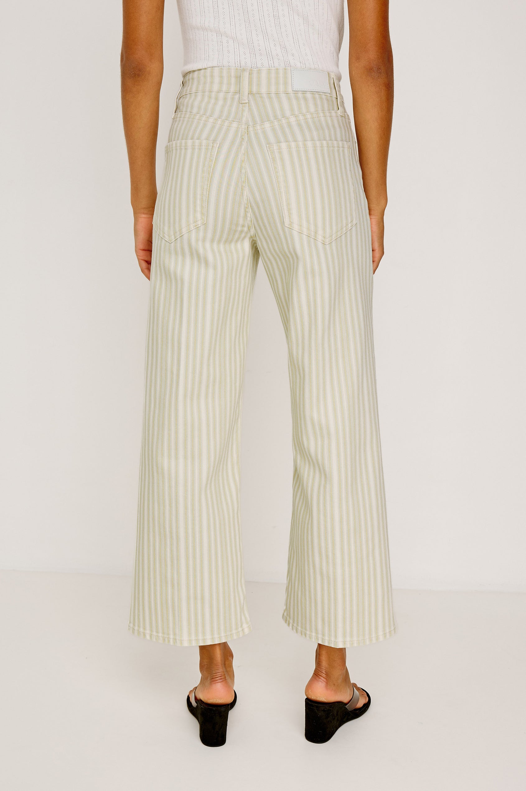 Getty Crop Jean in Light Stretch Denim With Wide Straight Legs, 27″ Inseam, 5-Pockets, Distressed Knee, and Zip Fly in Malibu Stripe Colorway - Lower Body Back View Featured on Model