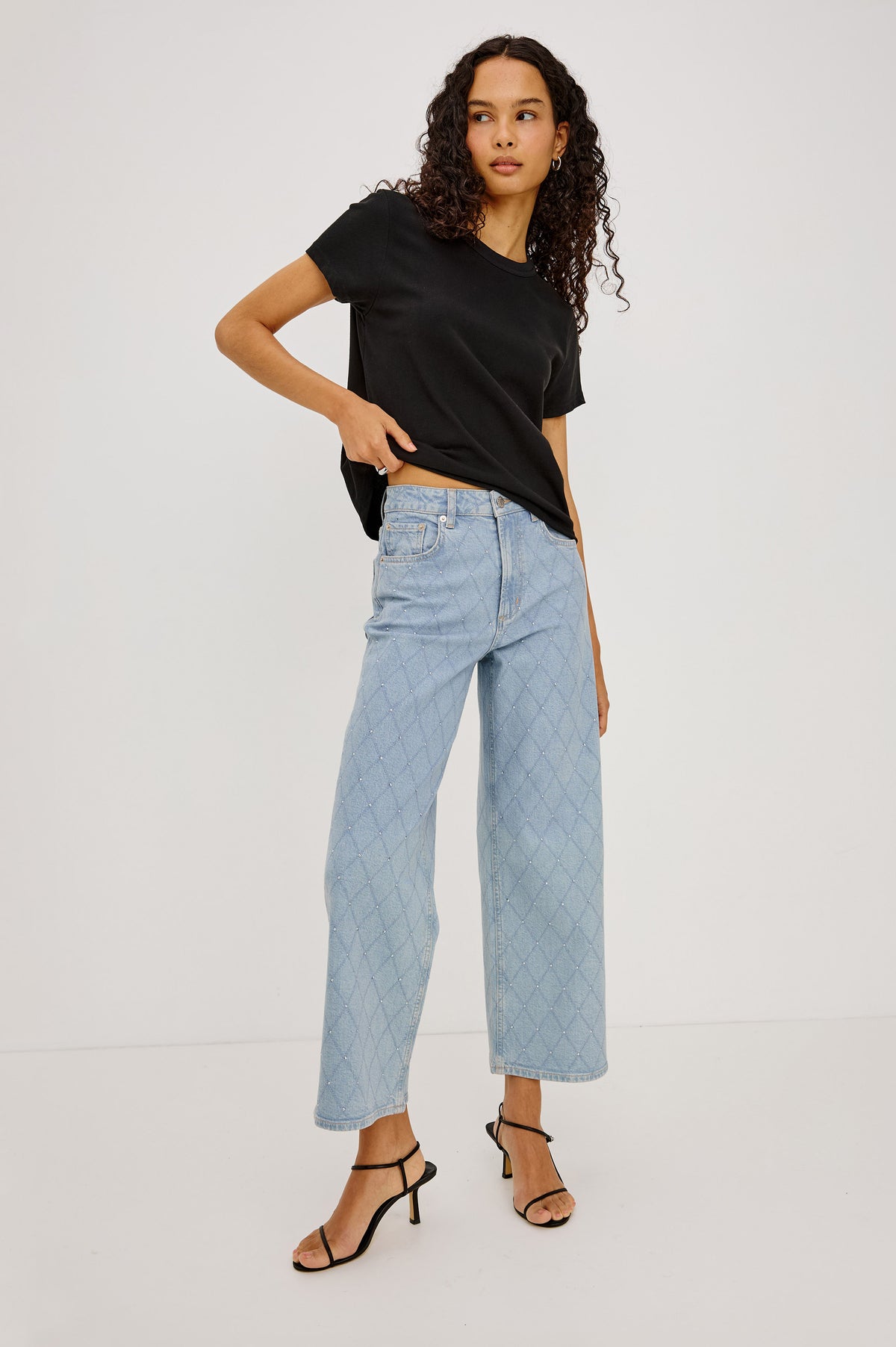 Getty Crop Wide Leg Jean in High-Stretch Denim With High-Rise, Wide Straight Leg Fit, 5-Pockets, and Zip Fly in Quilted Stud Colorway - Full Body Front View Featured on Model