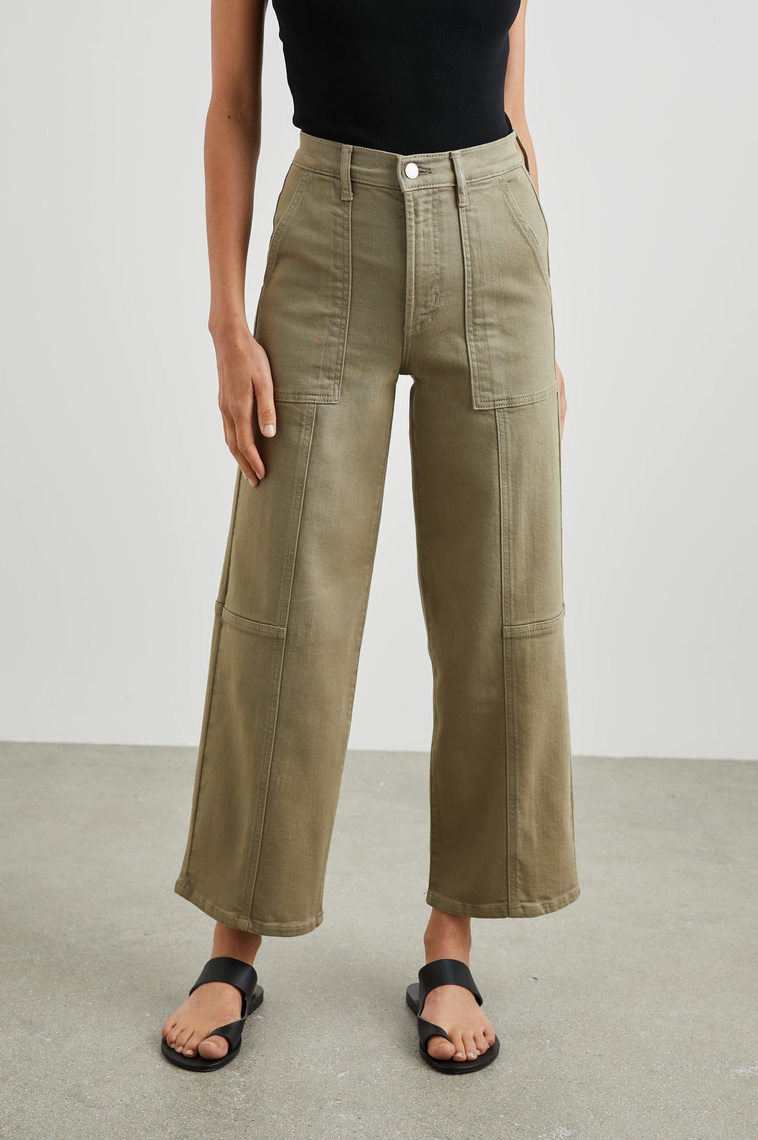 Getty Crop Utility Wide Leg Denim Pants with Belt Loops, Additional Seams, Two large Front Pockets and Two Back Patch Pockets in Washed Olive Colorway - Front View Featured on Model