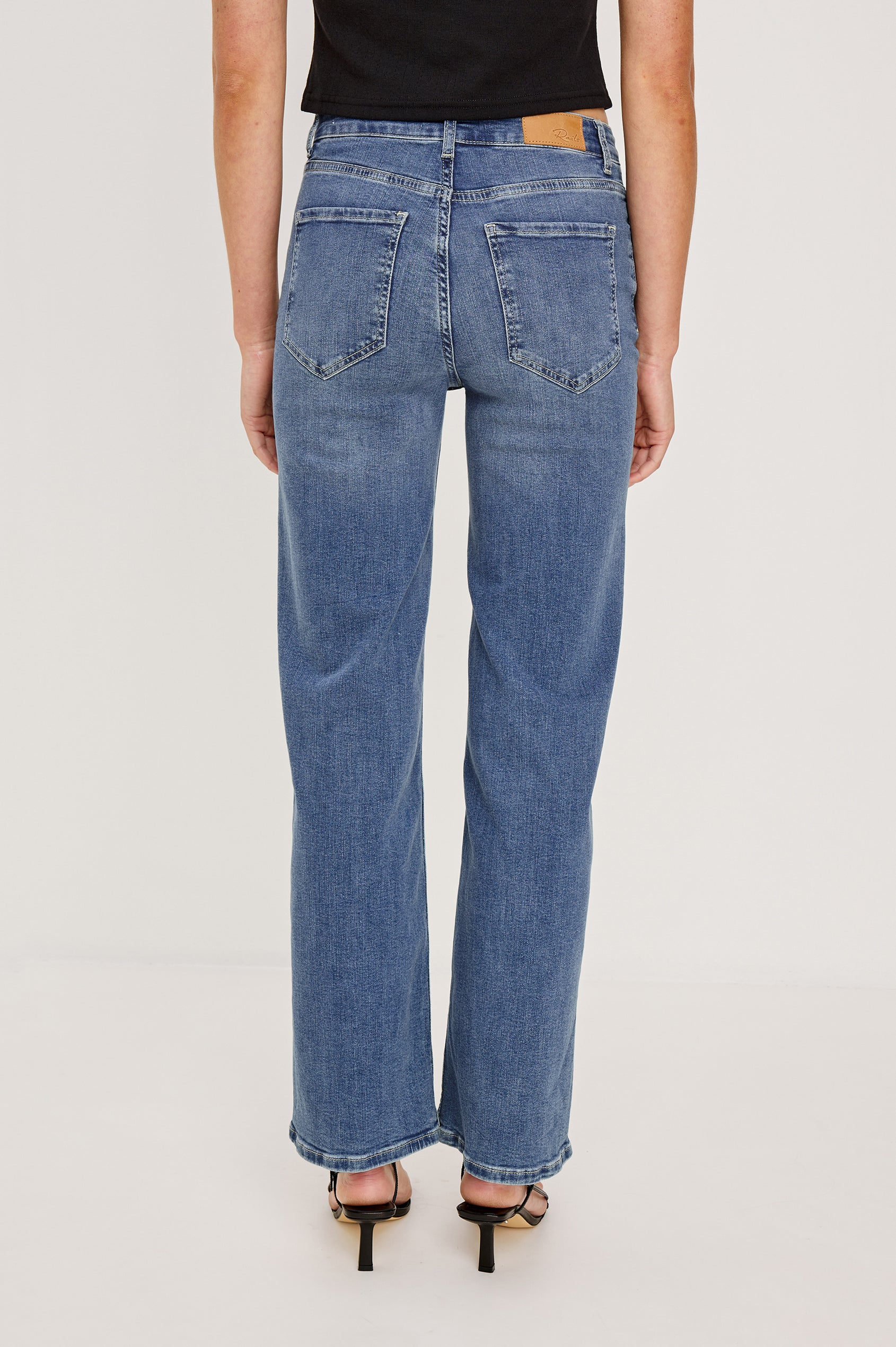 Getty Wide Leg Denim Pants with Belt Loops, Two Front Pockets and Two Back Patch Pockets in East Coast Colorway - Back View Featured on Model