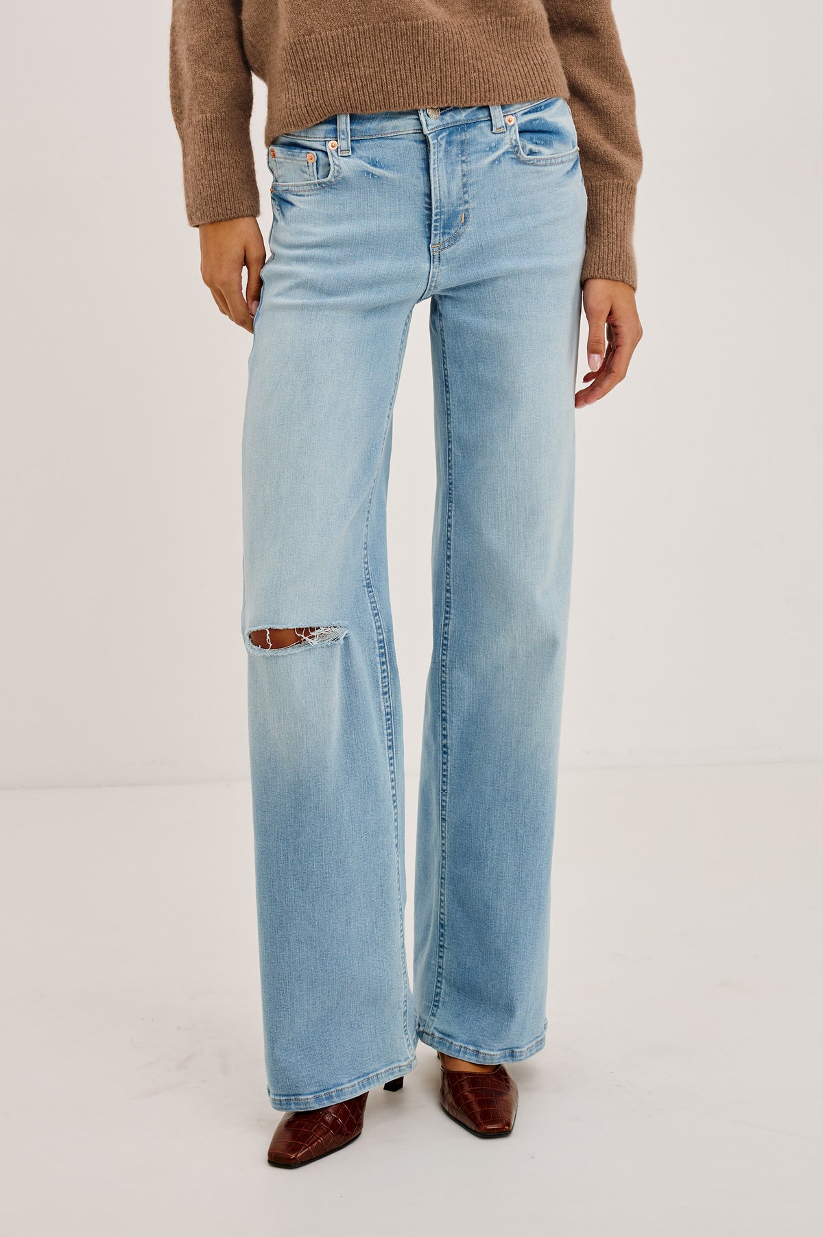 Getty Low Rise Wide Leg Jean in Comfort-stretch Denim With 5-Pockets in Wave Rider Colorway - Lower Body Front View Featured on Model