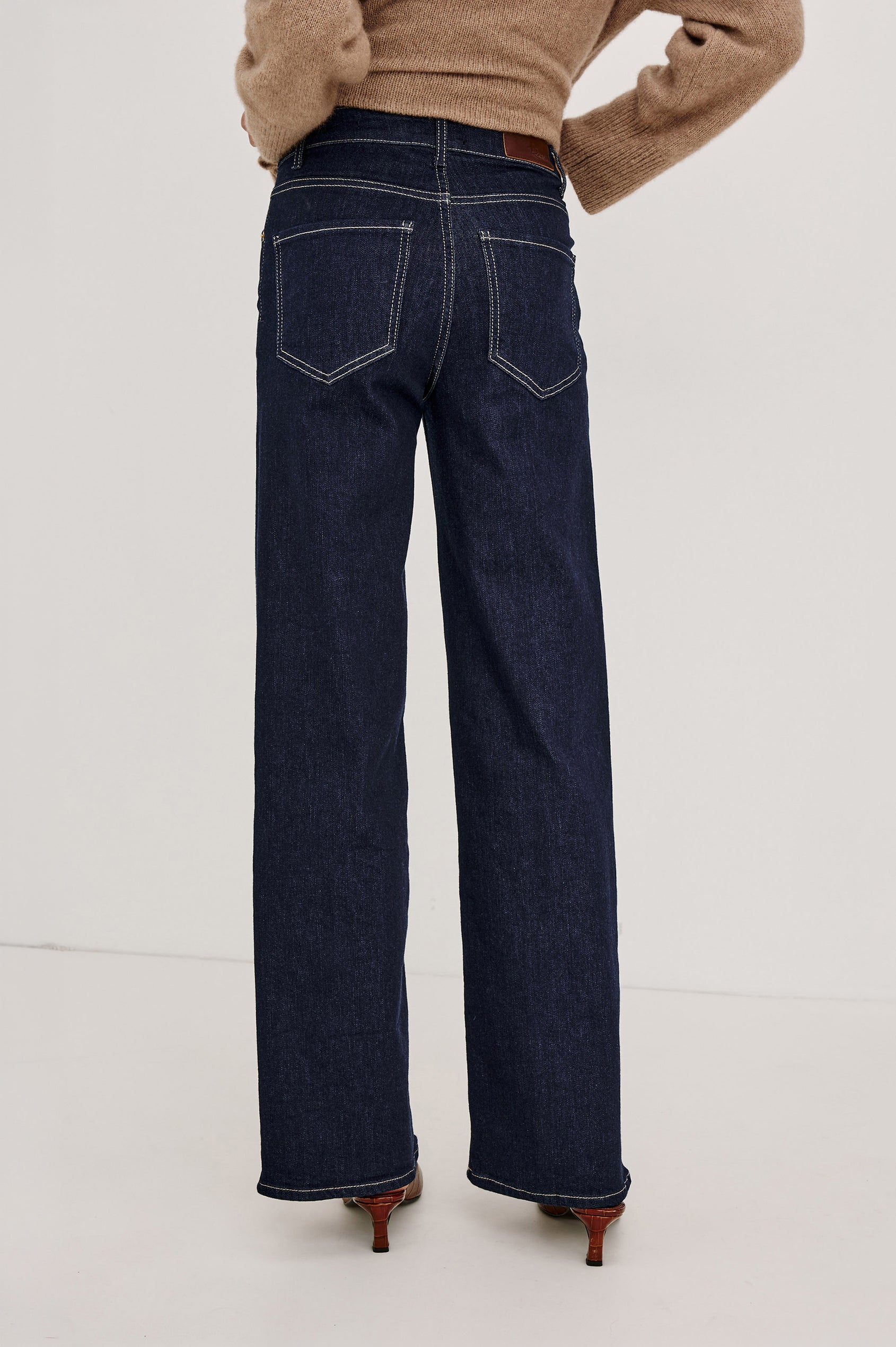 Getty Petite Wide Leg Jean in Light Comfort-Stretch Denim With High-Rise, 5-Pockets, and Zipper Fly in After Hours Colorway - Lower Body Back View Featured on Model