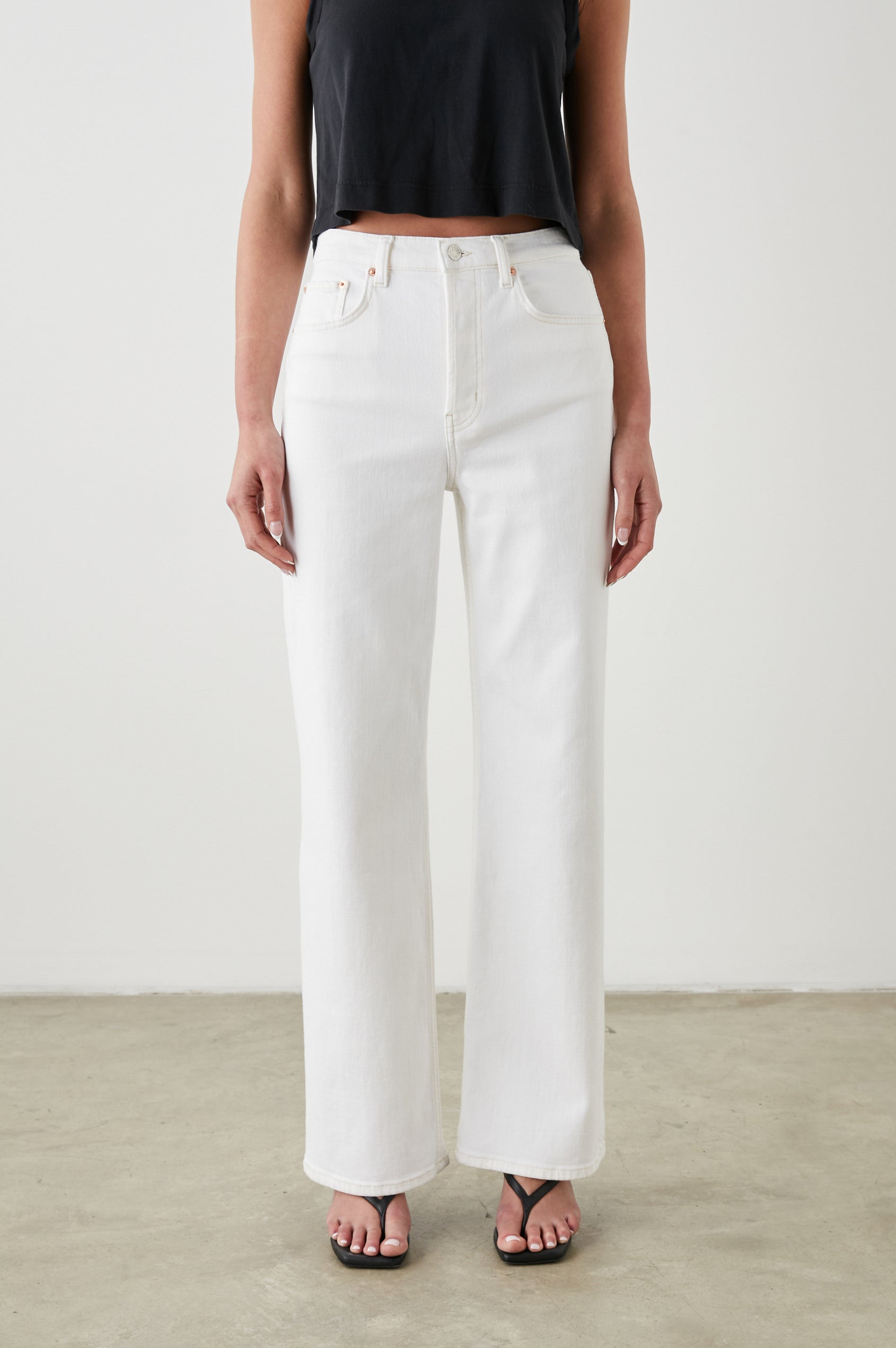 Getty Wide Leg Denim Pants with Belt Loops, Two Front Pockets and Two Back Patch Pockets in Vintage Ecru Colorway - Front View Featured on Model