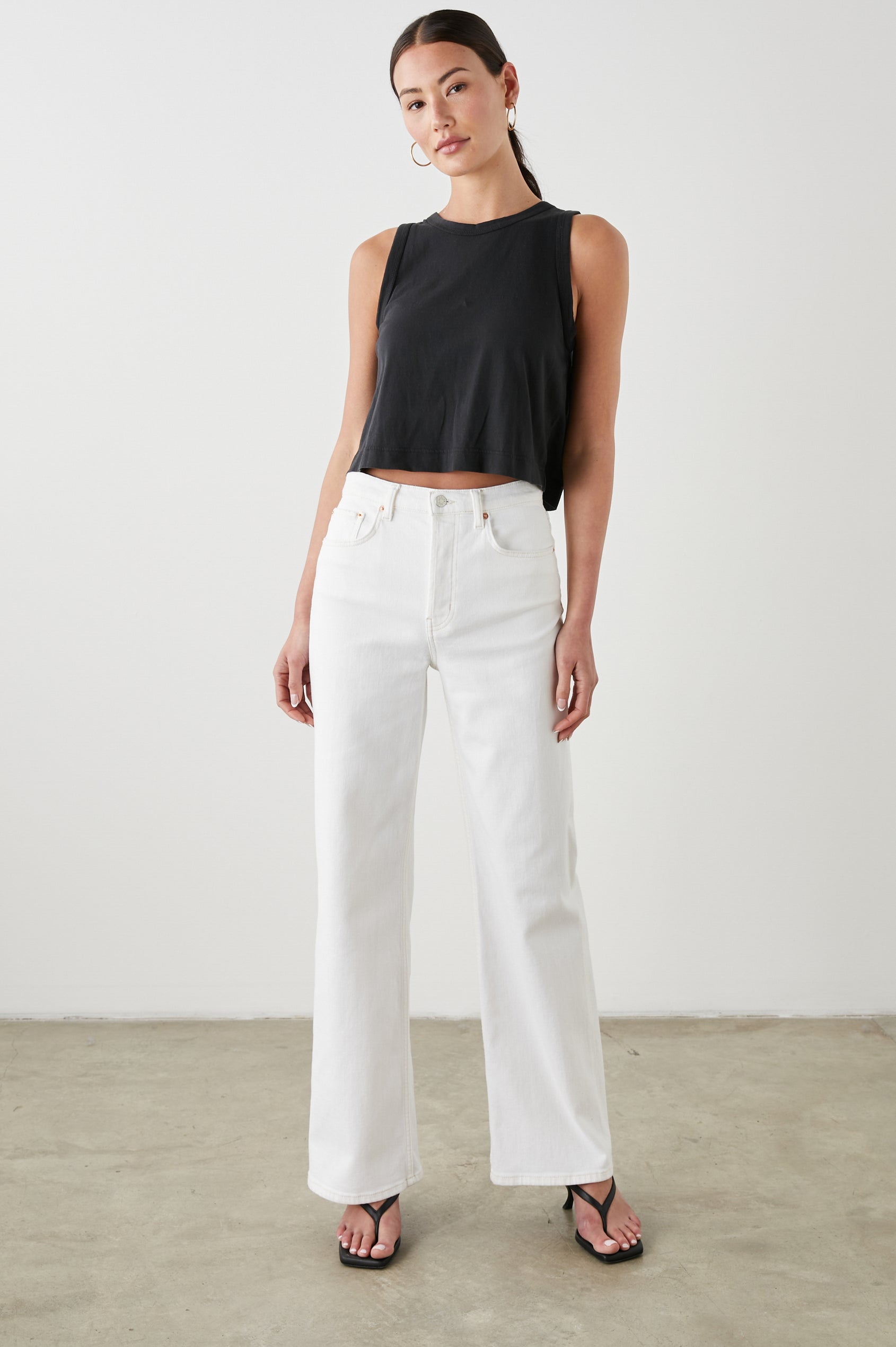 Getty Wide Leg Denim Pants with Belt Loops, Two Front Pockets and Two Back Patch Pockets in Vintage Ecru Colorway - Front View Featured on Model