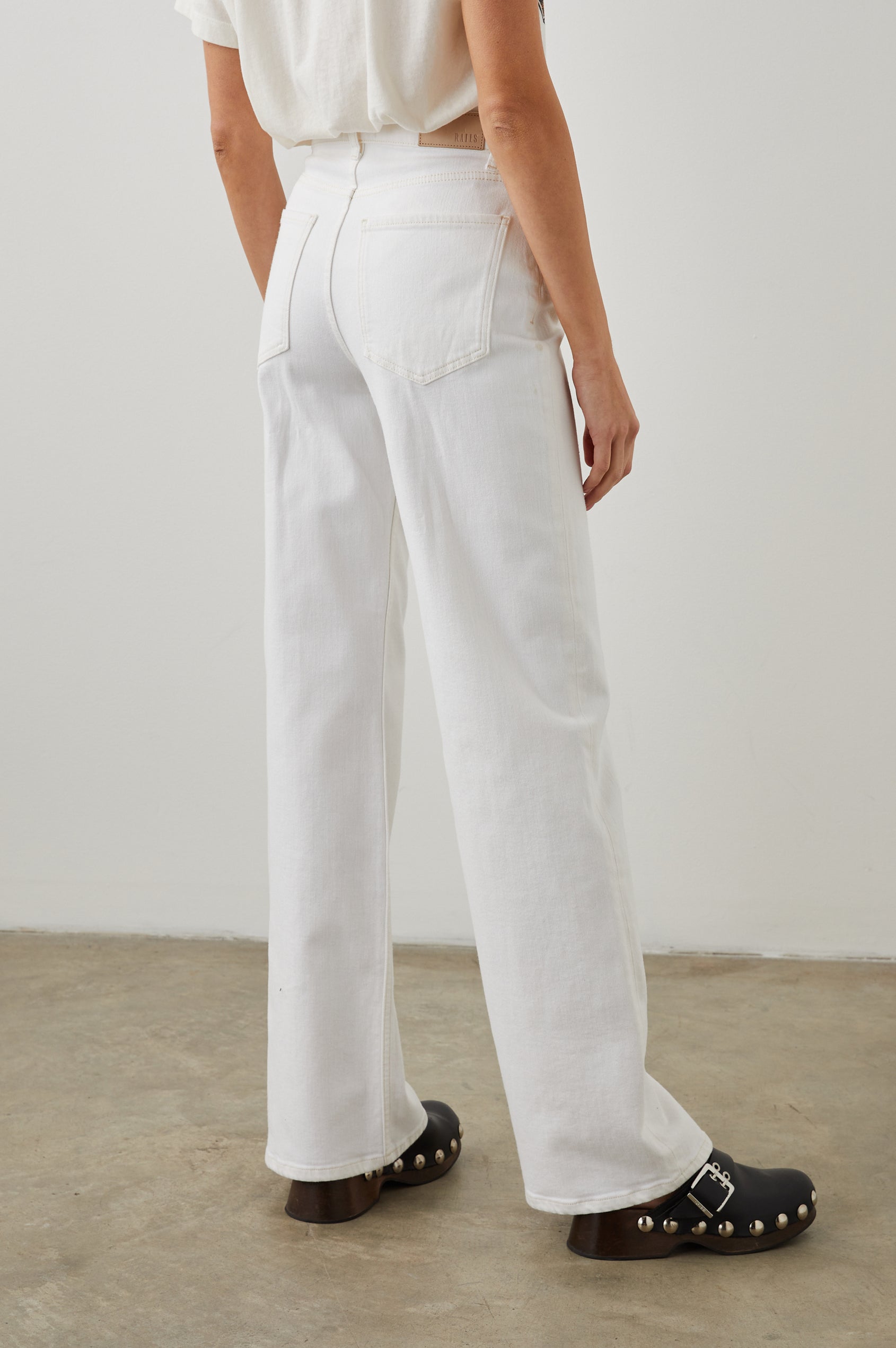 Getty Wide Leg Denim Pants with Belt Loops, Two Front Pockets and Two Back Patch Pockets in Vintage Ecru Colorway - Back View Featured on Model