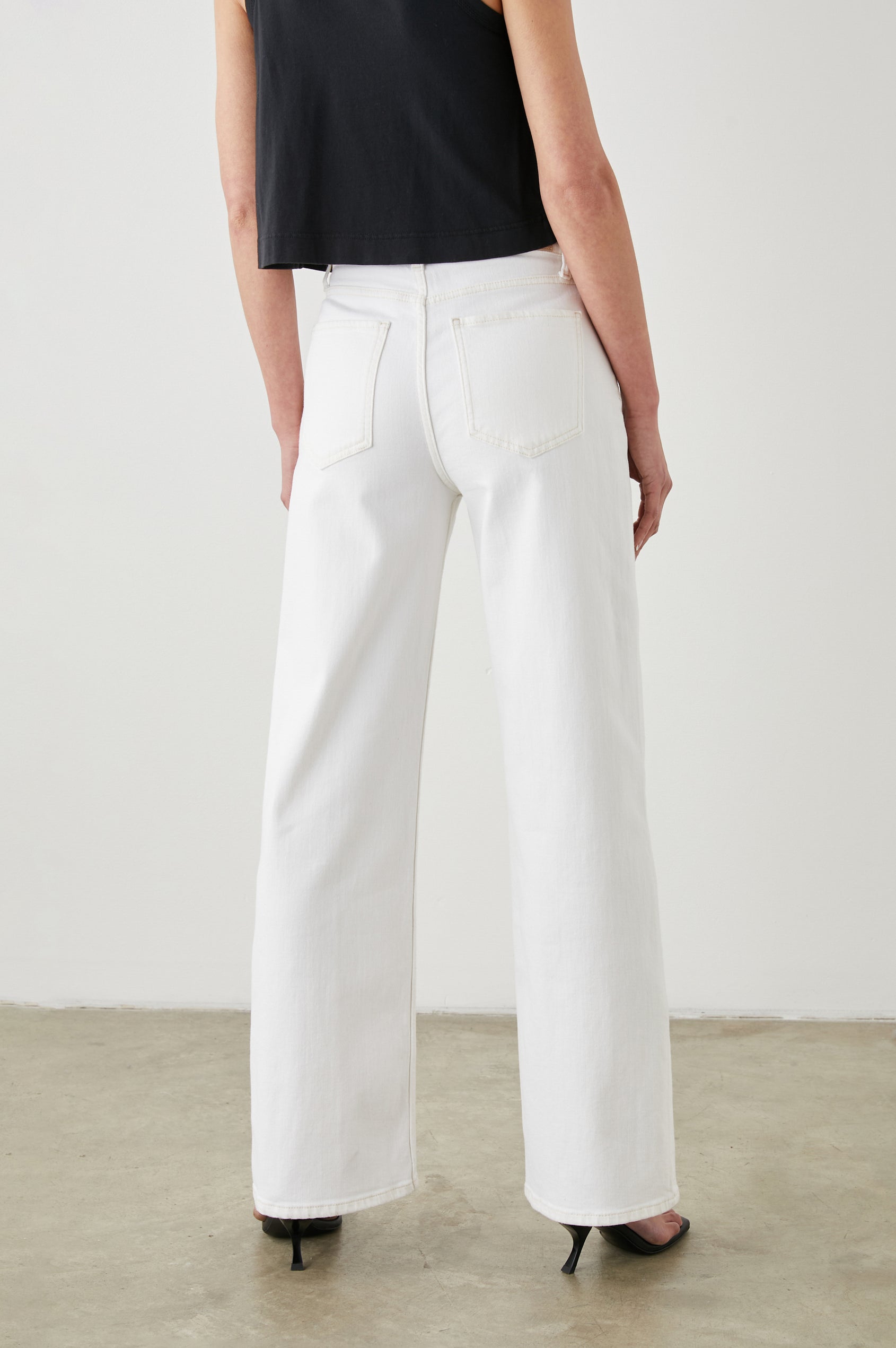 Getty Wide Leg Denim Pants with Belt Loops, Two Front Pockets and Two Back Patch Pockets in Vintage Ecru Colorway - Back View Featured on Model