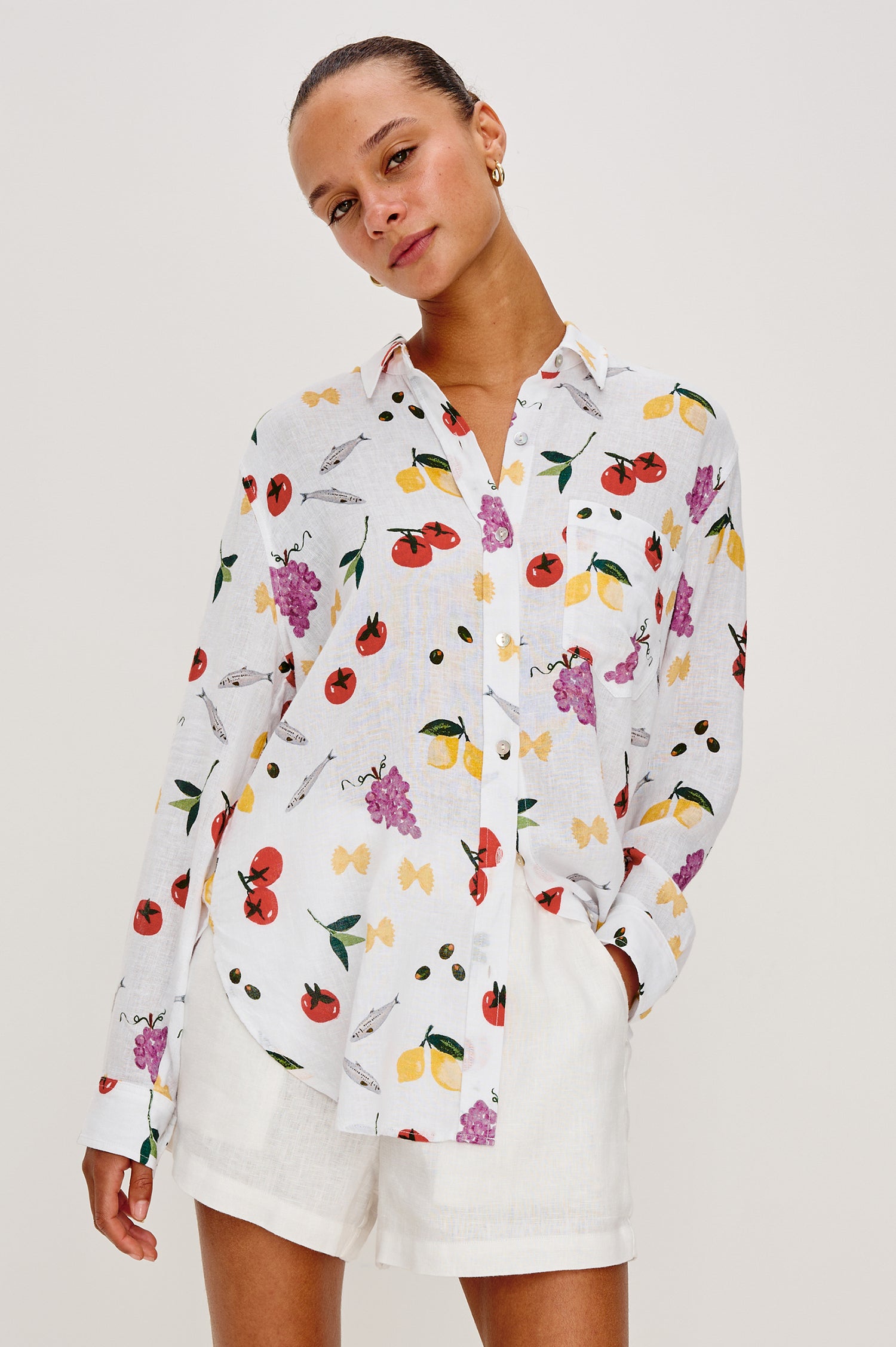 Giada lightweight linen button up shirt in Dinner Party colorway featuring Italian inspired sketches - front  view on model