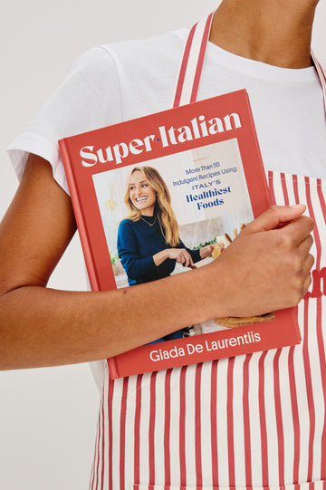 Giadzy Super Italian Cookbook - view of model holding the book, showing the front cover