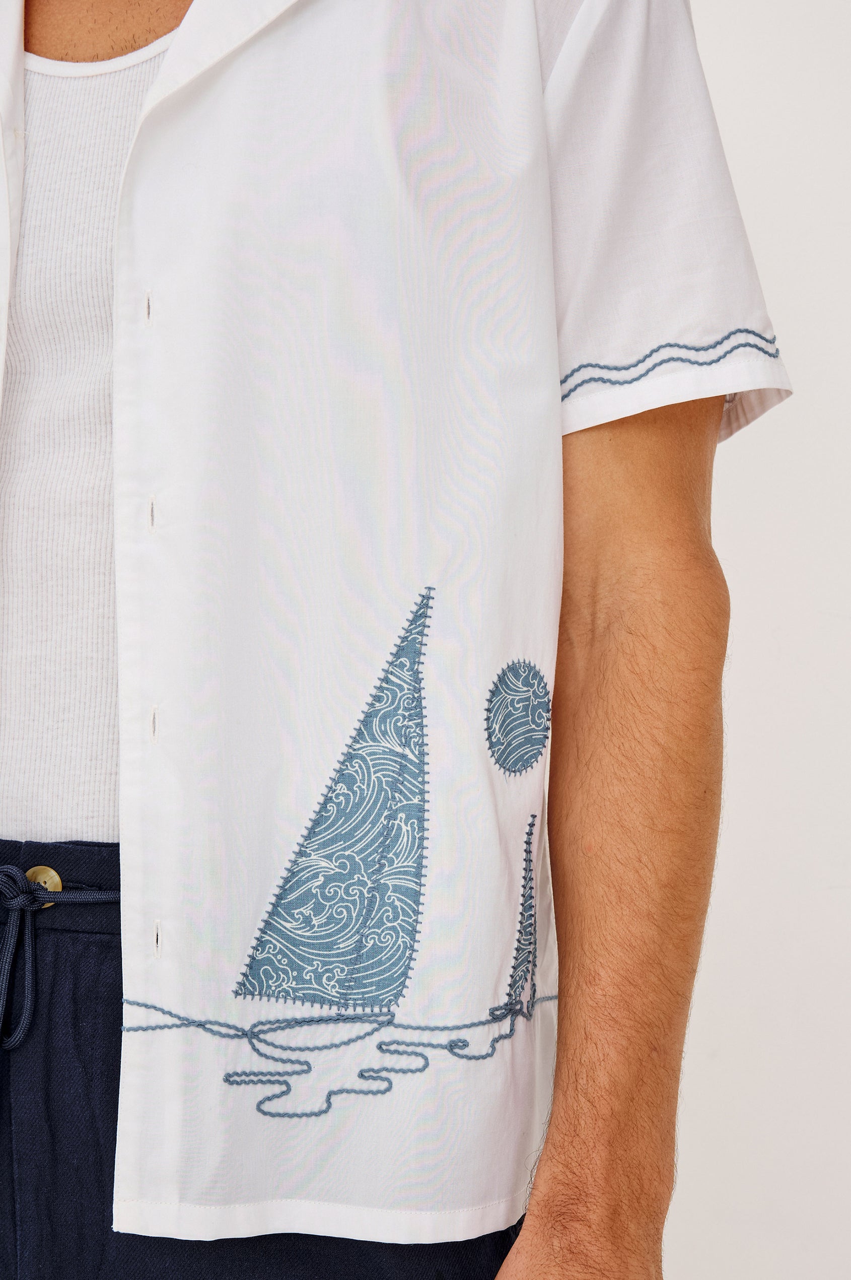 Gibson Camp Shirt in Linen-Cotton Dobby With Open Collar, Front Buttons, Short Sleeves, and Relaxed Fit in White Sail Horizon Colorway - Upper Body Close Up View Featured on Model