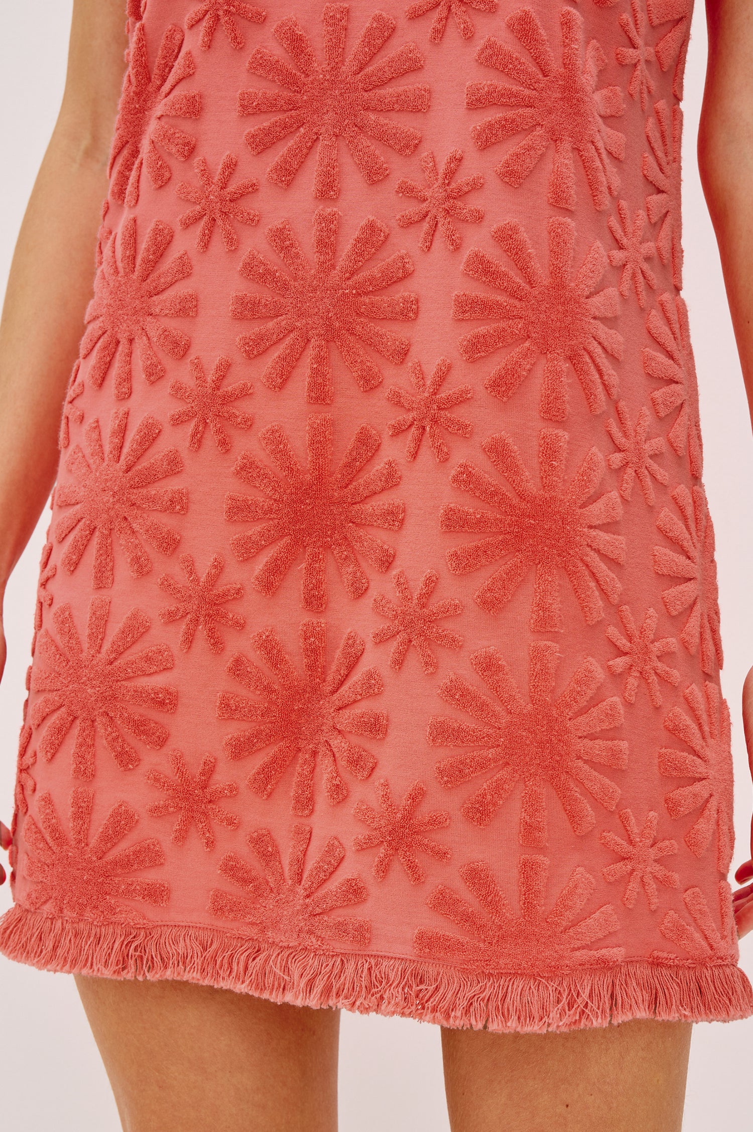 Ginger Mini Tank Dress with Fringed Hem and a Low Scoop Back in Red Sunburst Jacquard. Front Detail View Shown on Model.