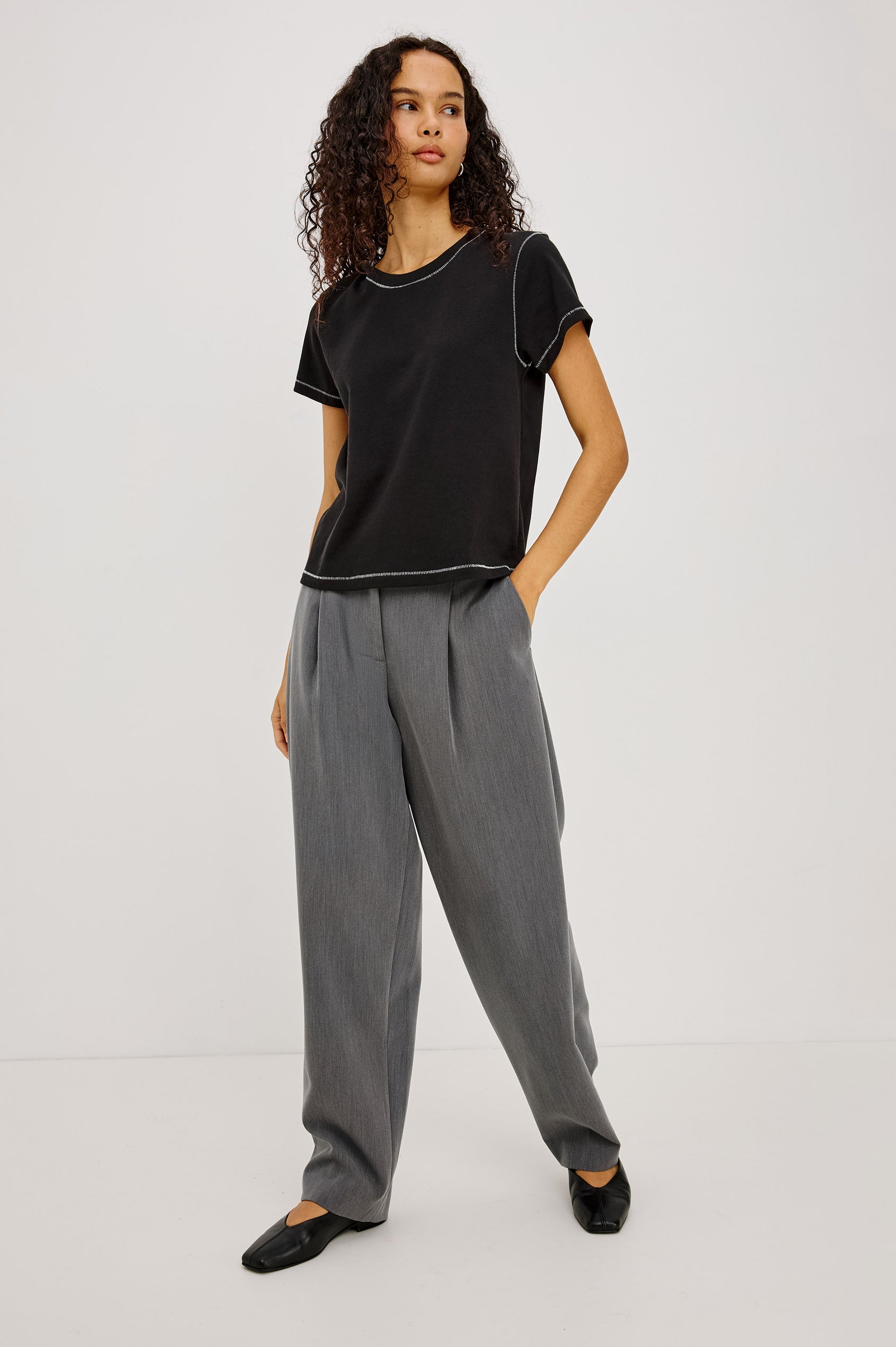 Girlfriend Pleated Jersey Tee With Crew Neckline, Short Sleeves, and Relaxed Slightly-Boxy Fit in Black Contrast Stitch Colorway - Full Body Front View Featured on Model