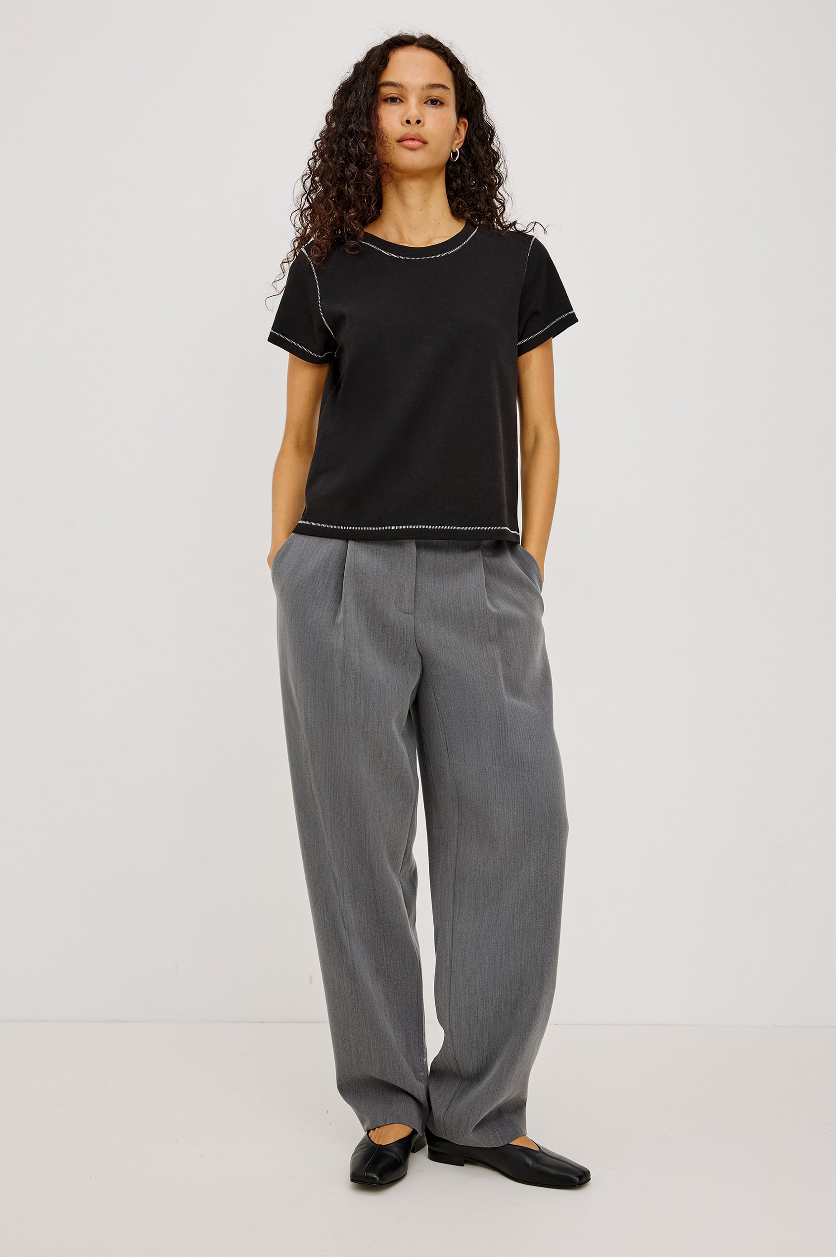 Girlfriend Pleated Jersey Tee With Crew Neckline, Short Sleeves, and Relaxed Slightly-Boxy Fit in Black Contrast Stitch Colorway - Full Body Front View Featured on Model