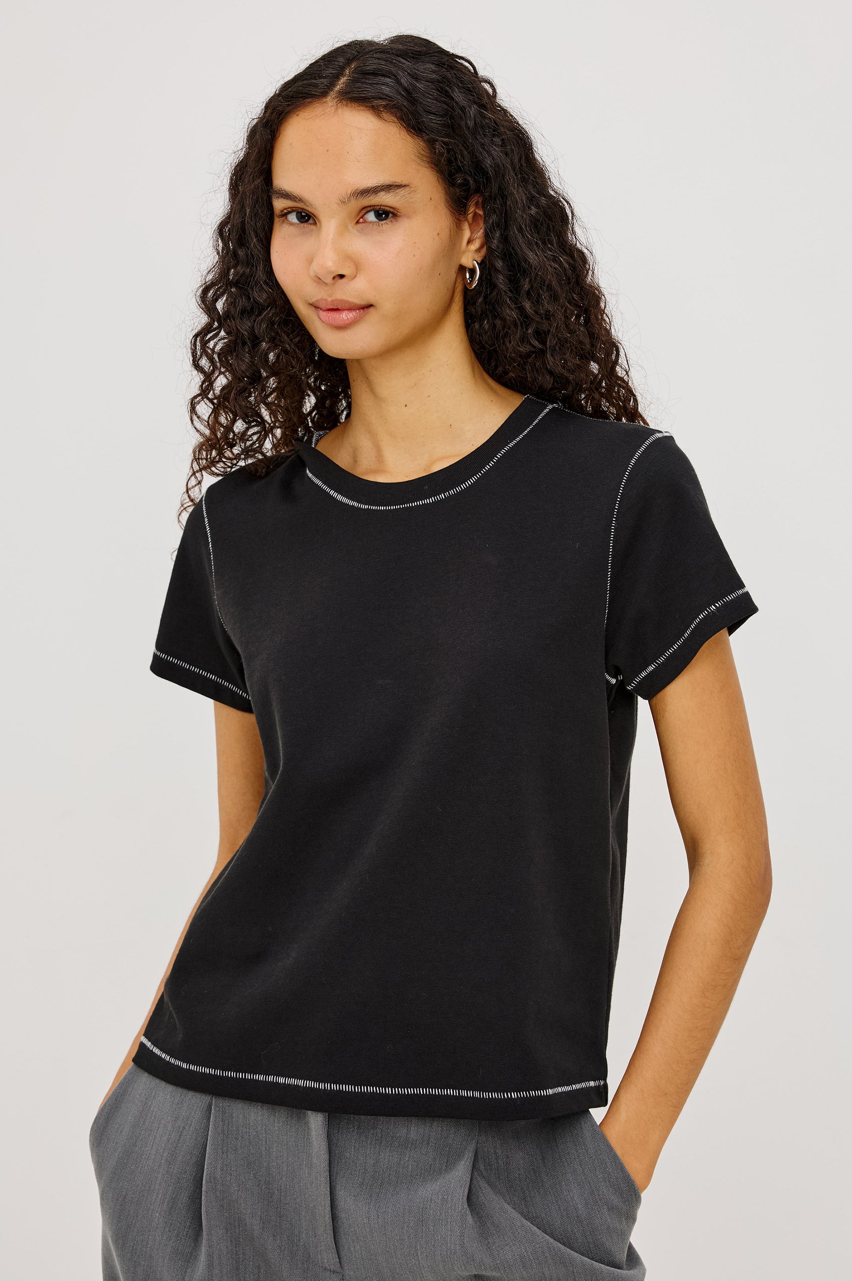 Girlfriend Pleated Jersey Tee With Crew Neckline, Short Sleeves, and Relaxed Slightly-Boxy Fit in Black Contrast Stitch Colorway - Upper Body Front View Featured on Model